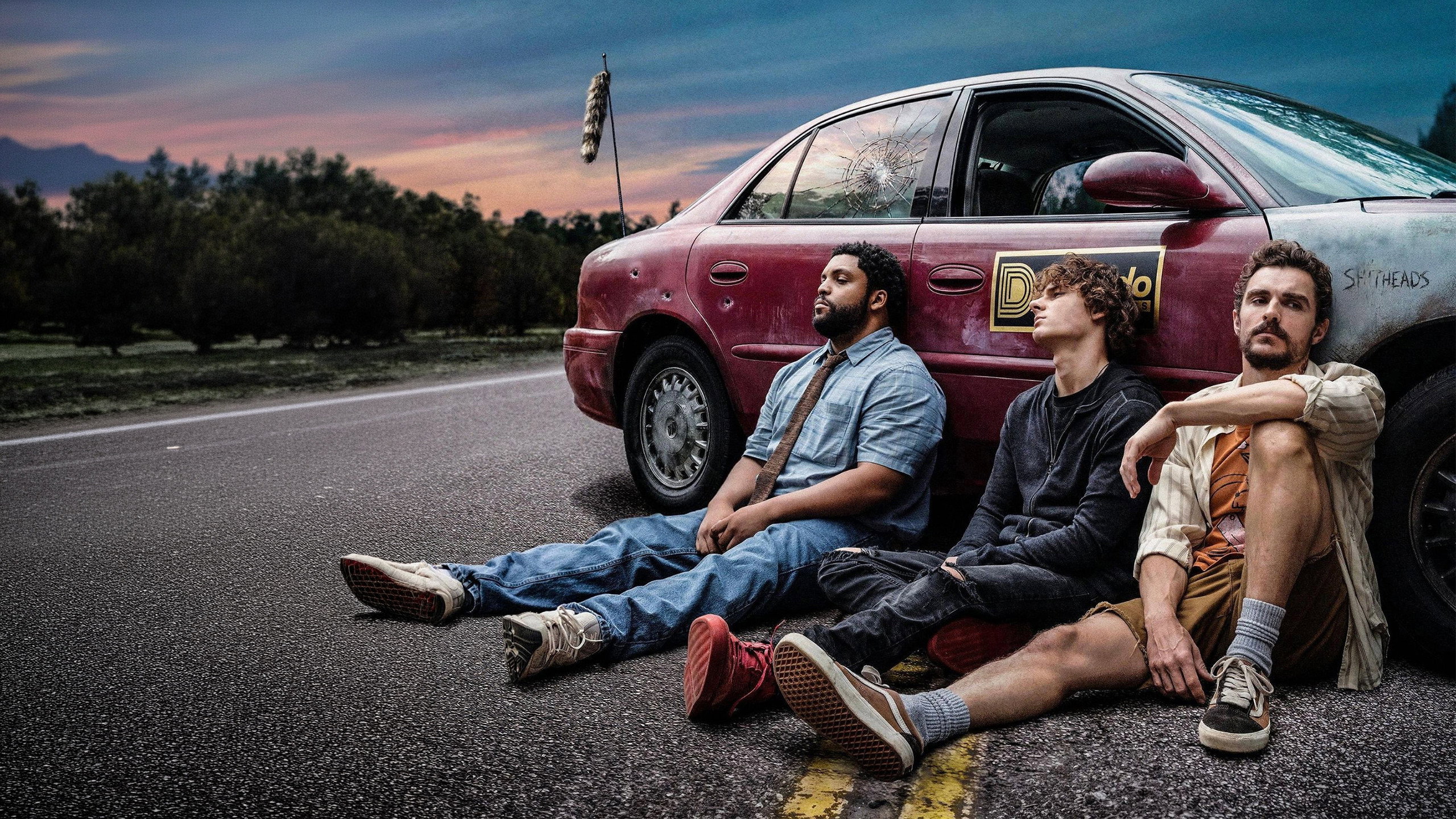 Three men and a damaged car on a road HD Wallpaper