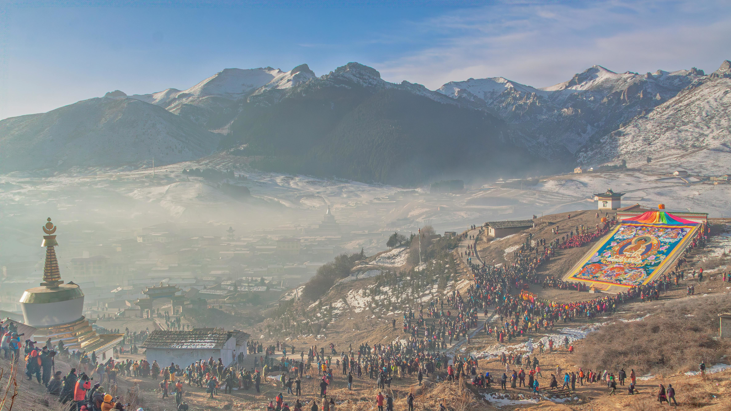 Buddhist Thangka Unveiling Ceremony in Snowy Mountains HD Wallpaper