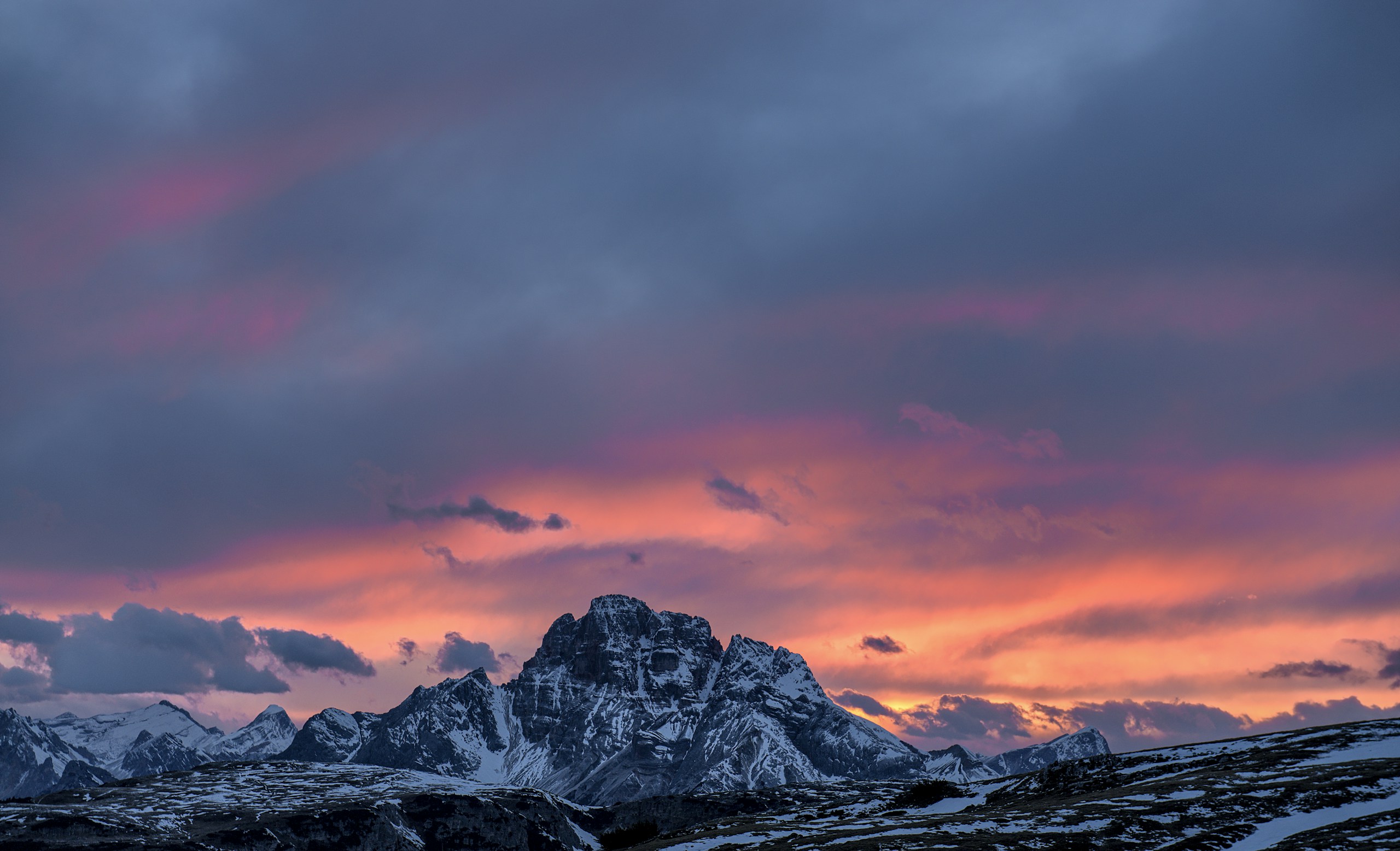 Snow-capped mountains at sunset HD Wallpaper