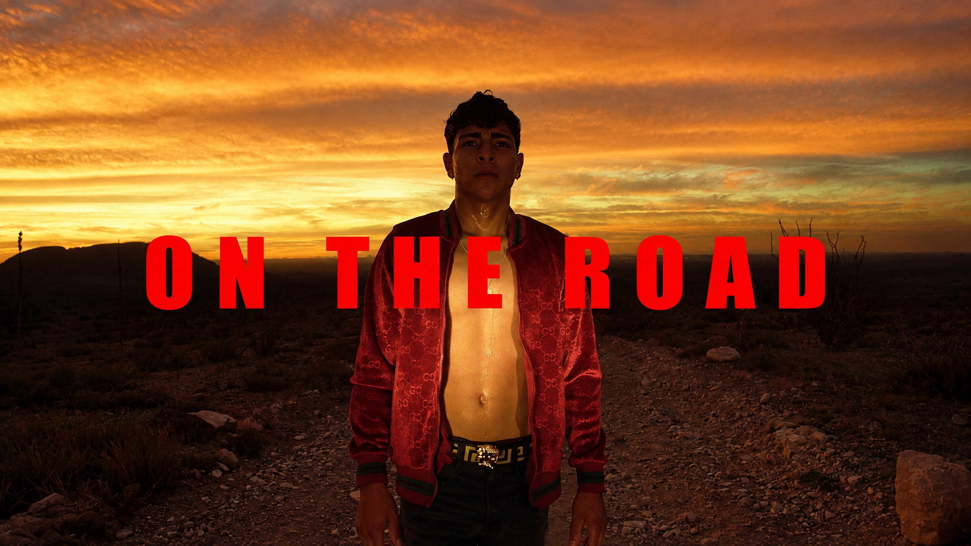 Man in red jacket on road with sunset sky HD Wallpaper