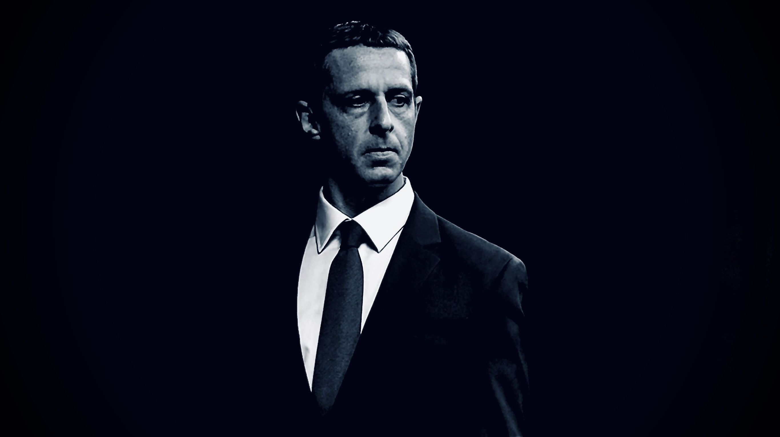 Mark Zuckerberg in a suit, looking away HD Wallpaper