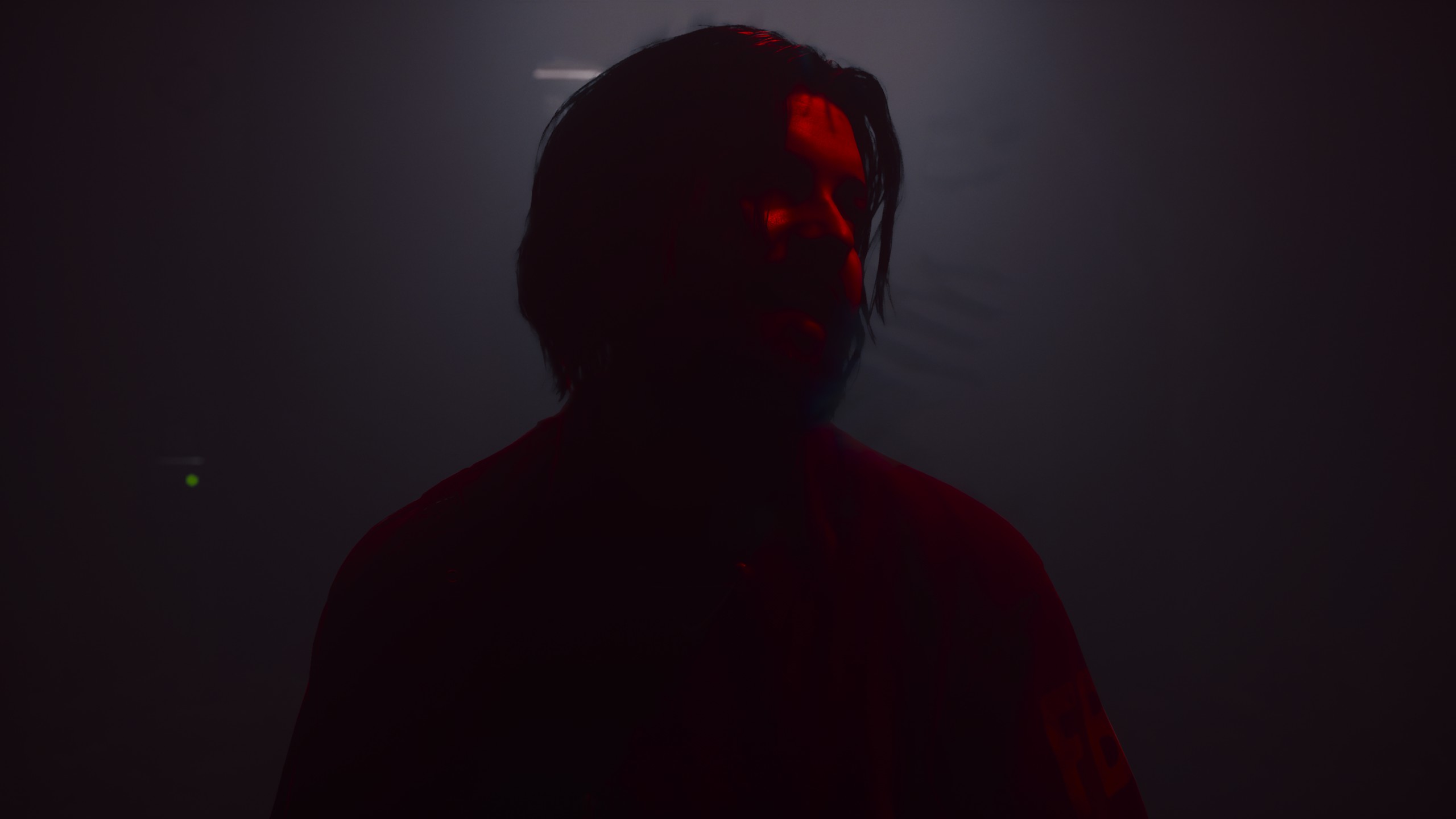 Man in red light, dark background HD Wallpaper