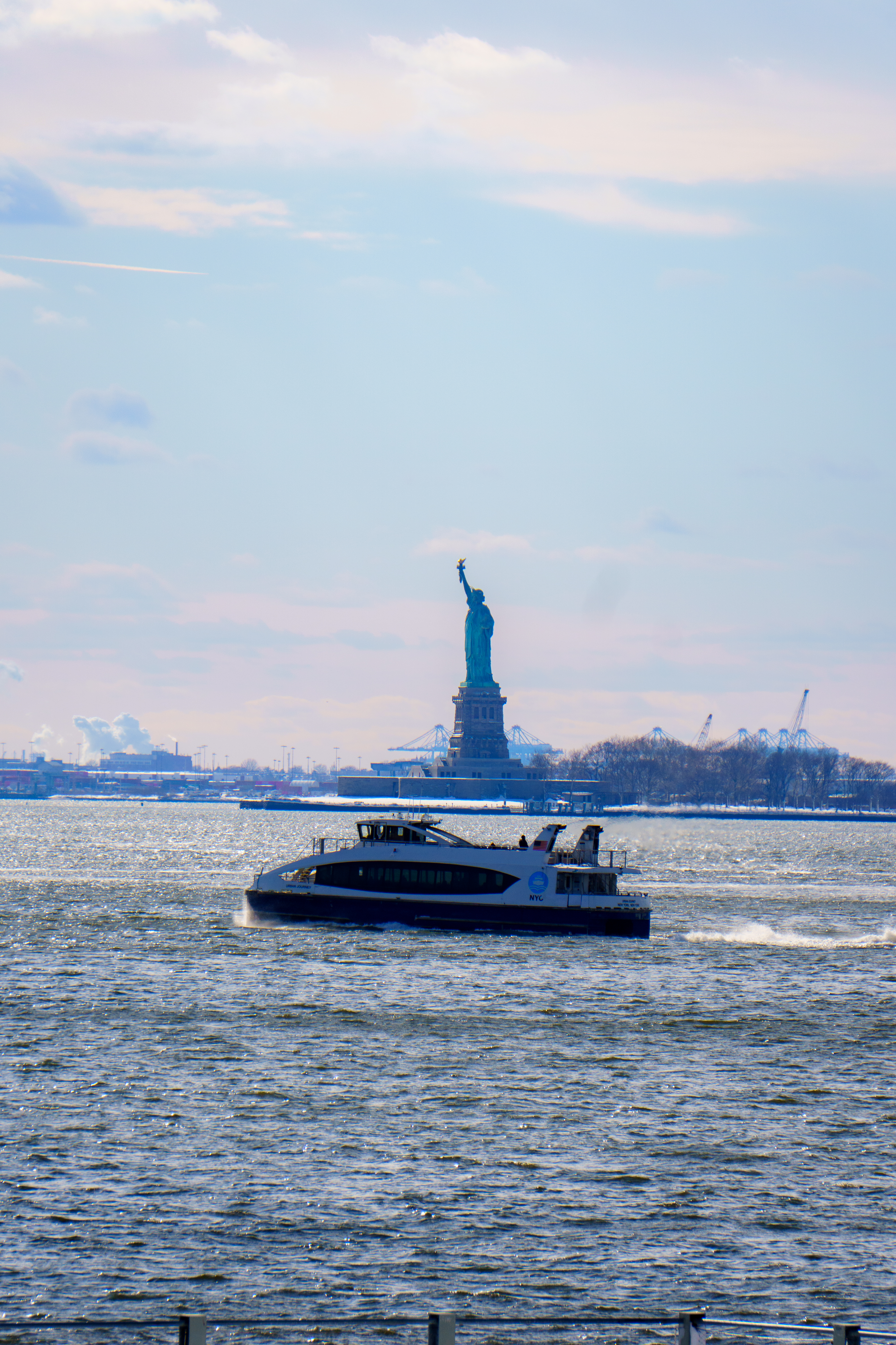 Ferry boat near Statue of Liberty in New York City HD Wallpaper