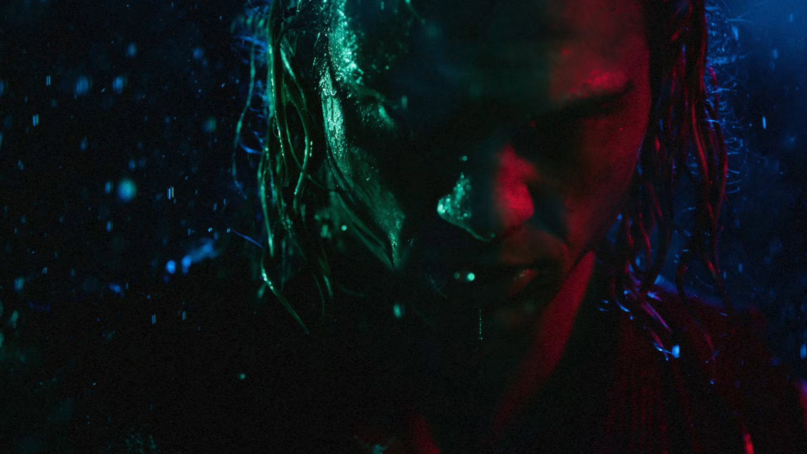 Man in Rain with Blue and Red Lighting HD Wallpaper