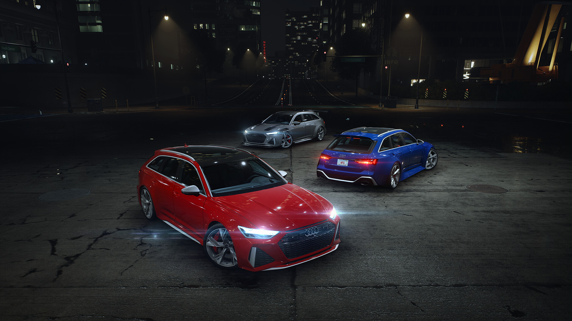 Three Audi RS6 Avant cars at night in a city HD Wallpaper