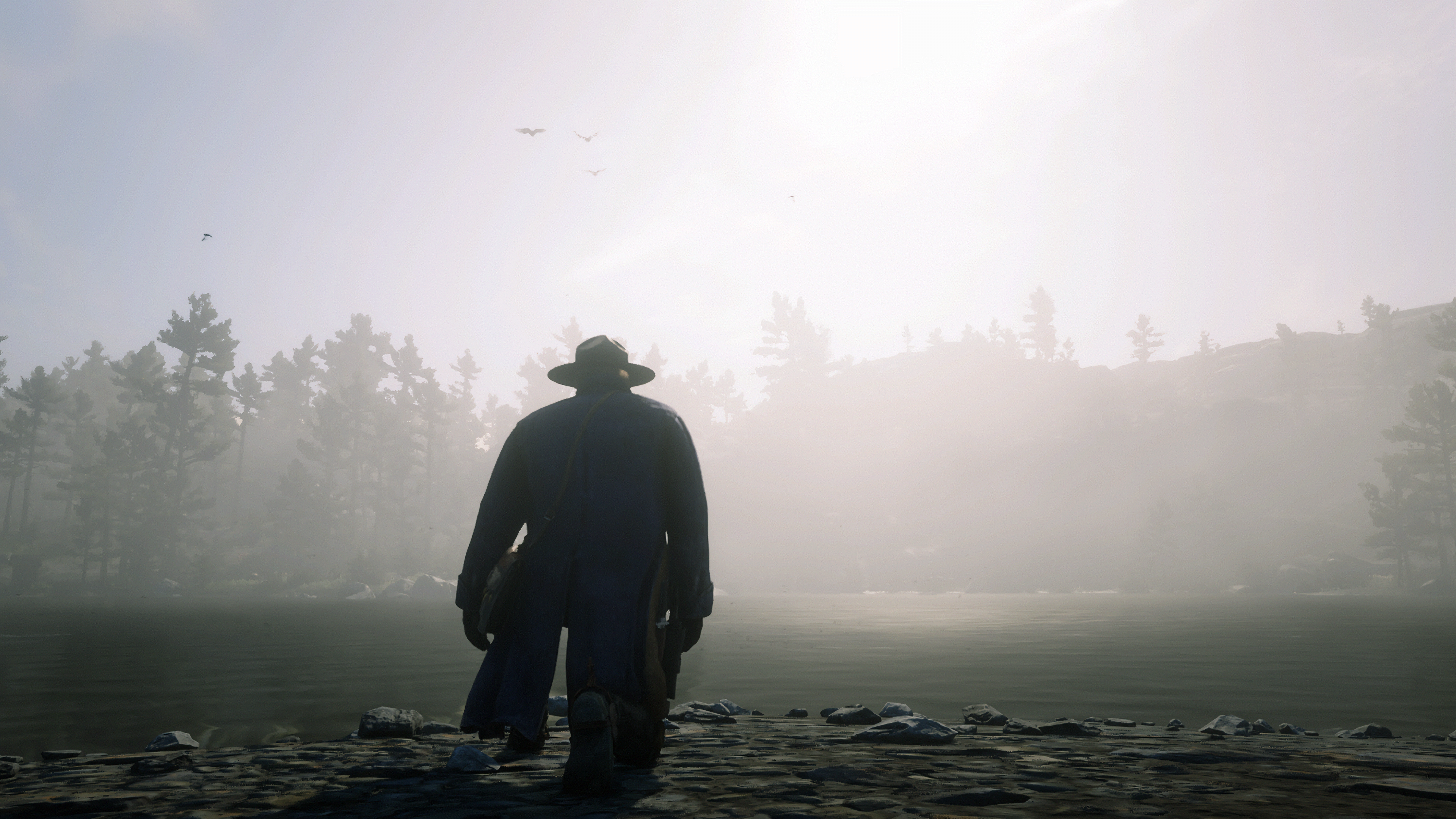Man in hat and coat by a foggy lake HD Wallpaper