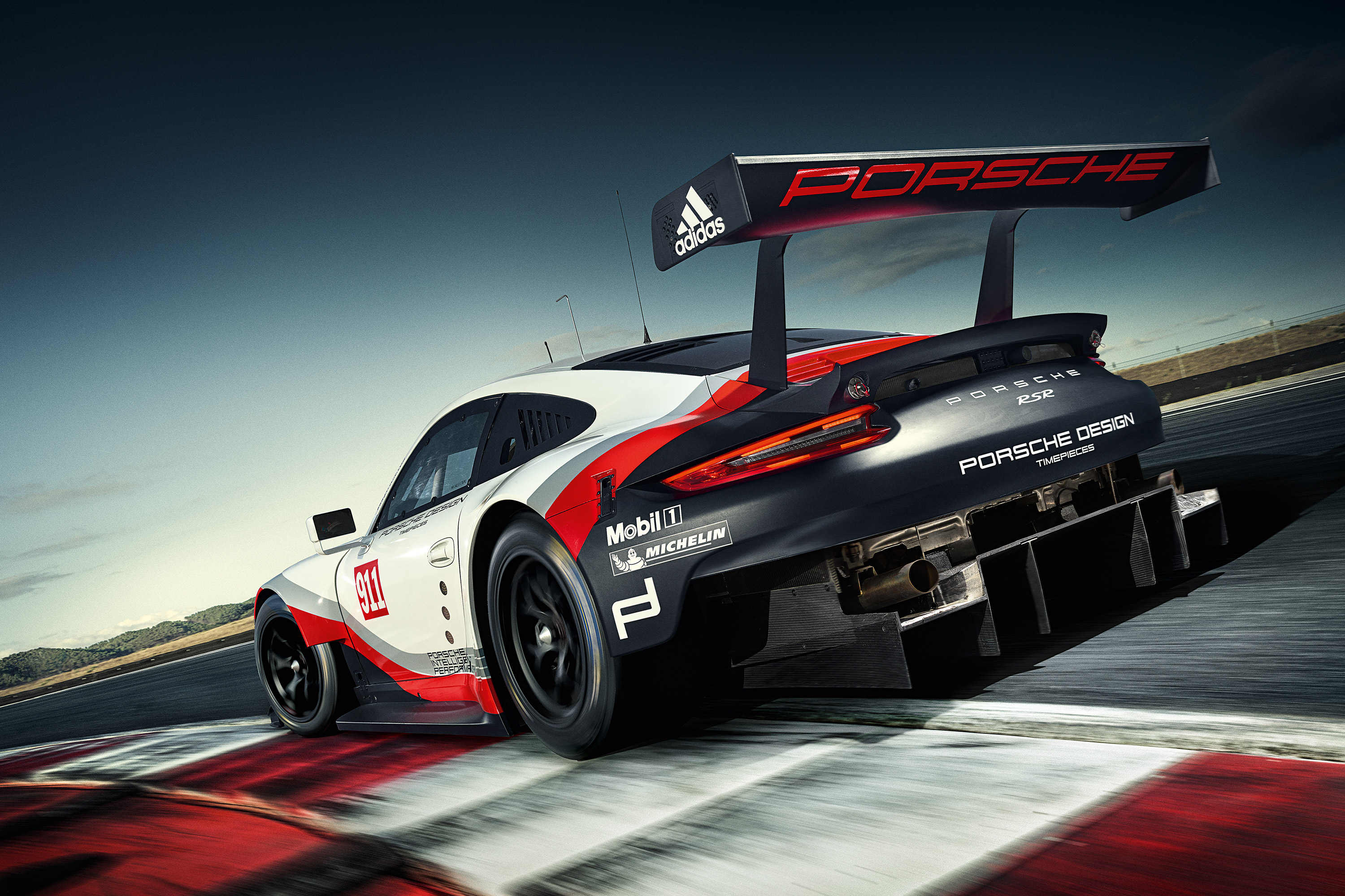 Porsche 911 RSR race car on track HD Wallpaper