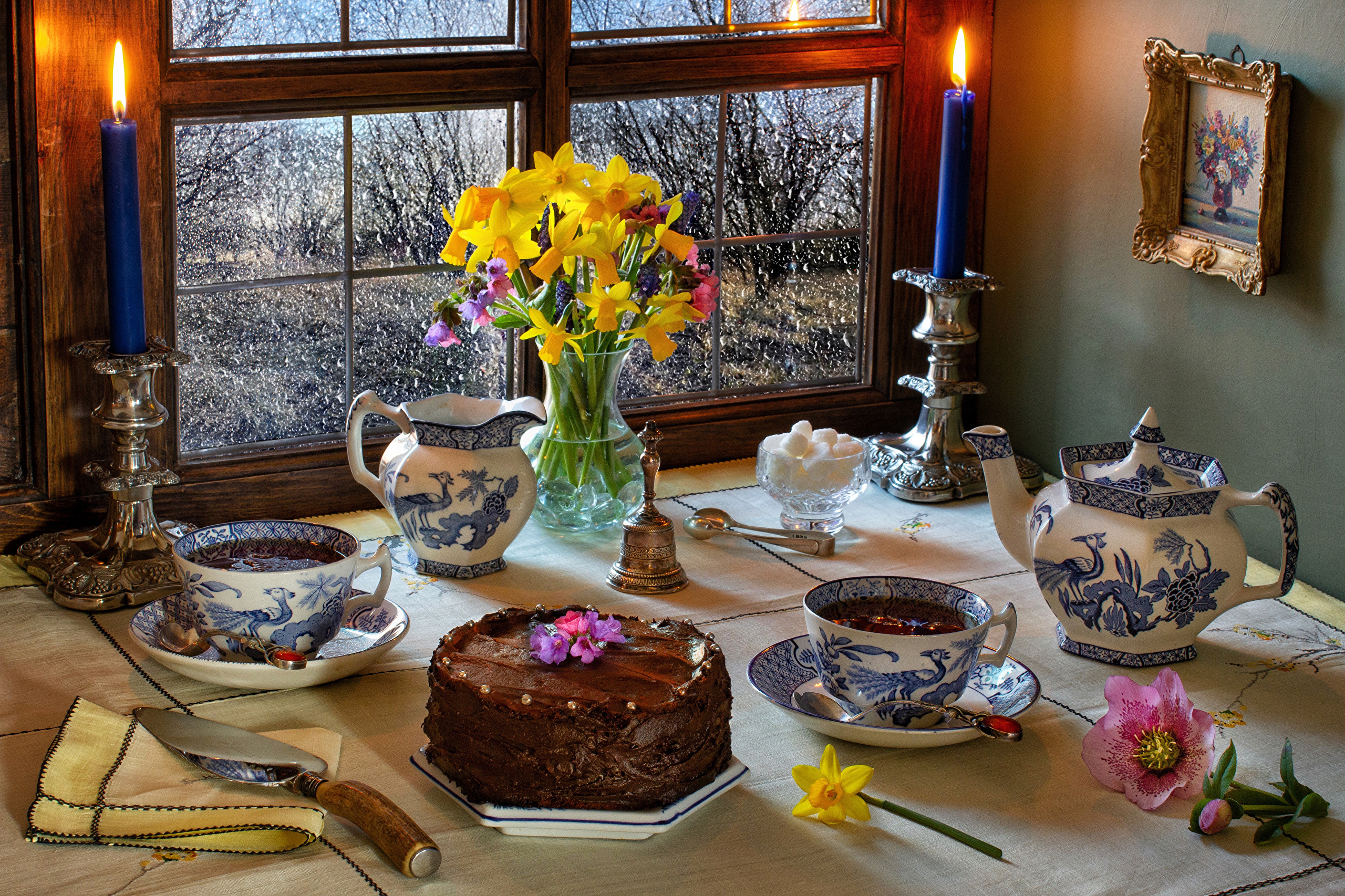 Chocolate cake and tea set by a rainy window HD Wallpaper