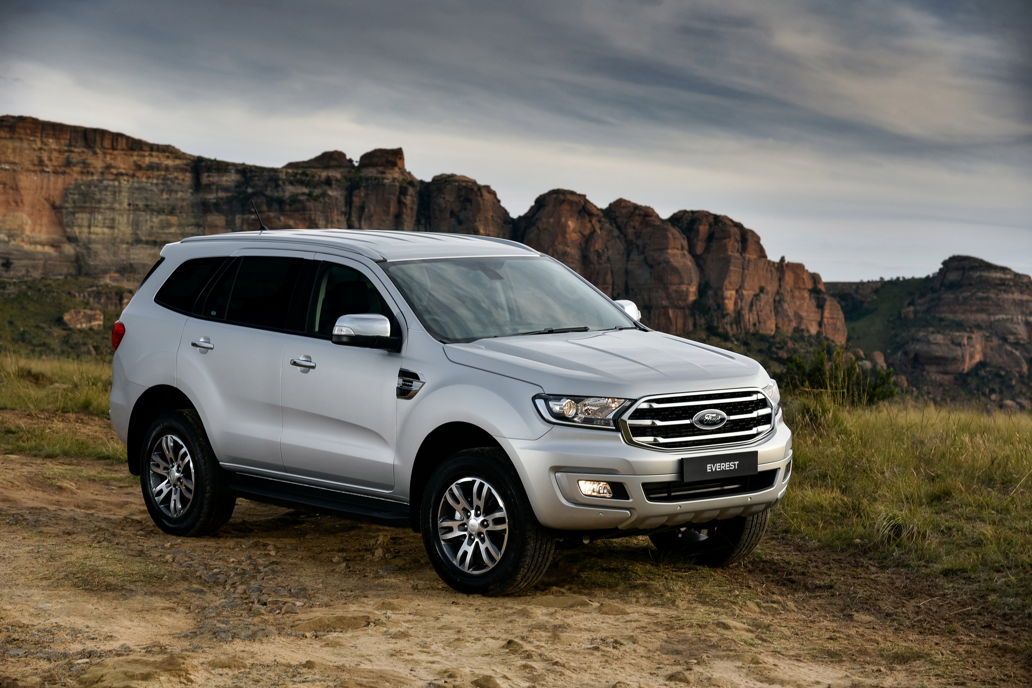 Silver Ford Everest SUV in a Rocky Landscape HD Wallpaper