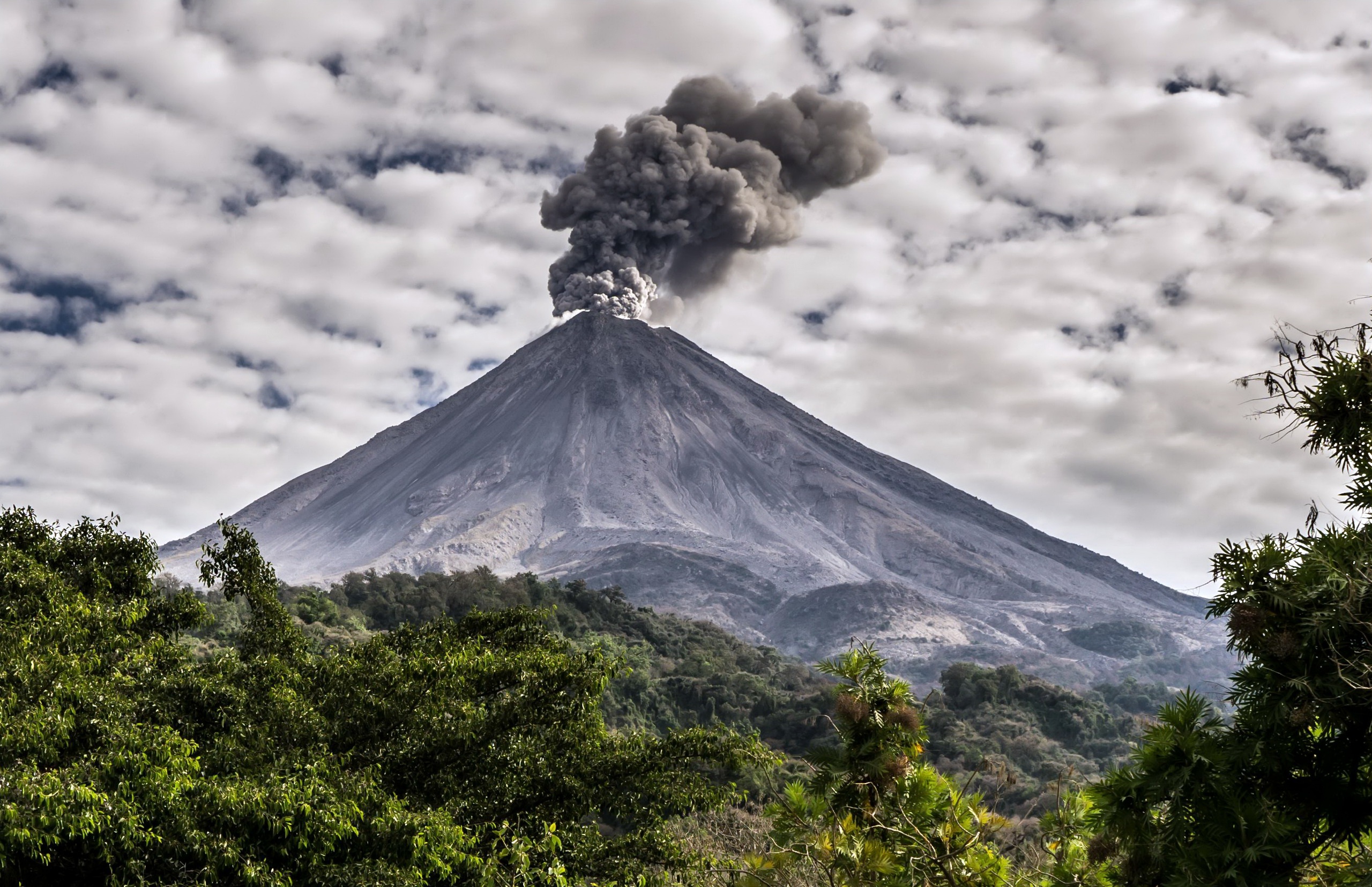 Volcano erupting with smoke and ash HD Wallpaper