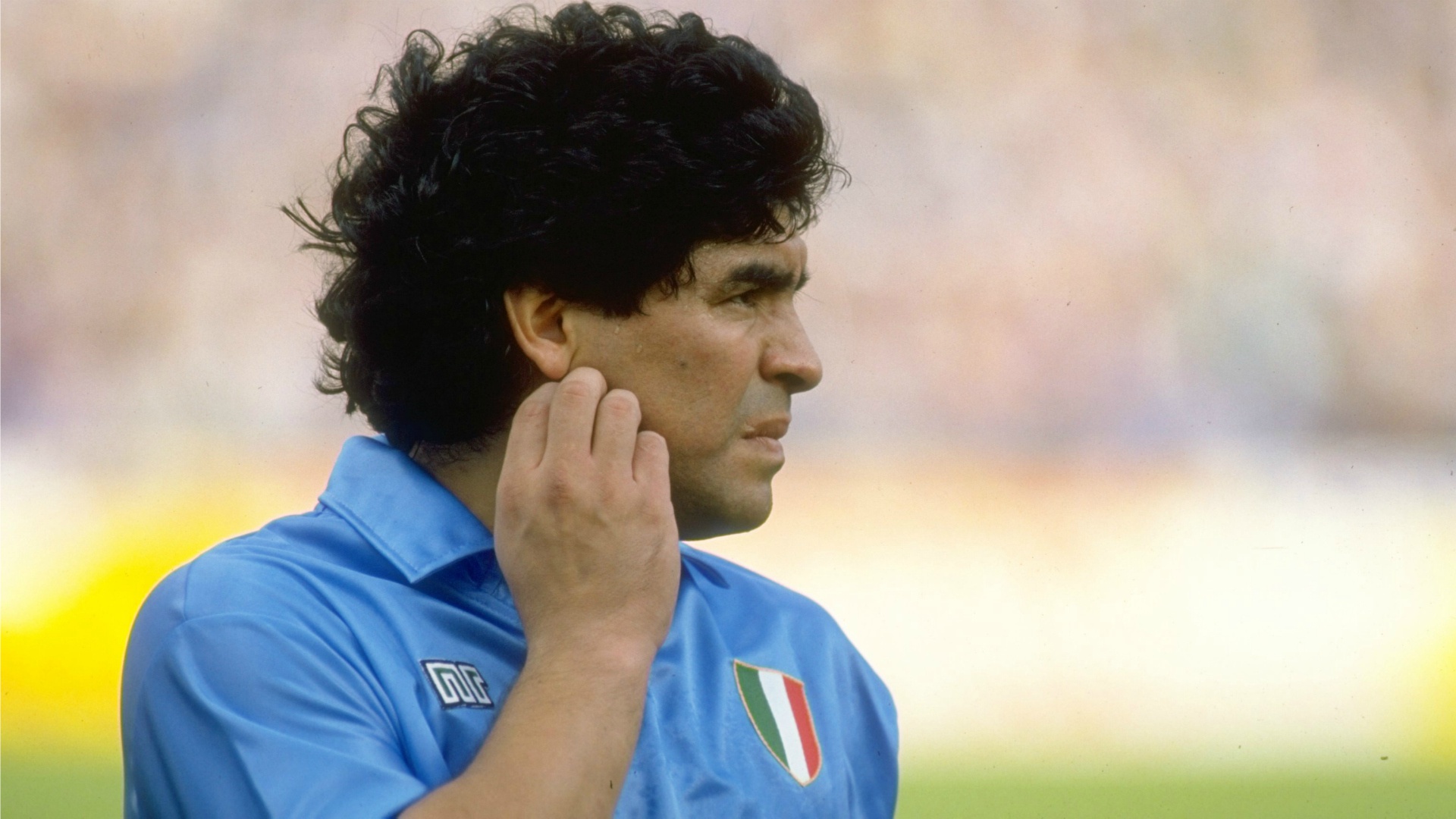 Diego Maradona in a blue Napoli jersey HD Wallpaper