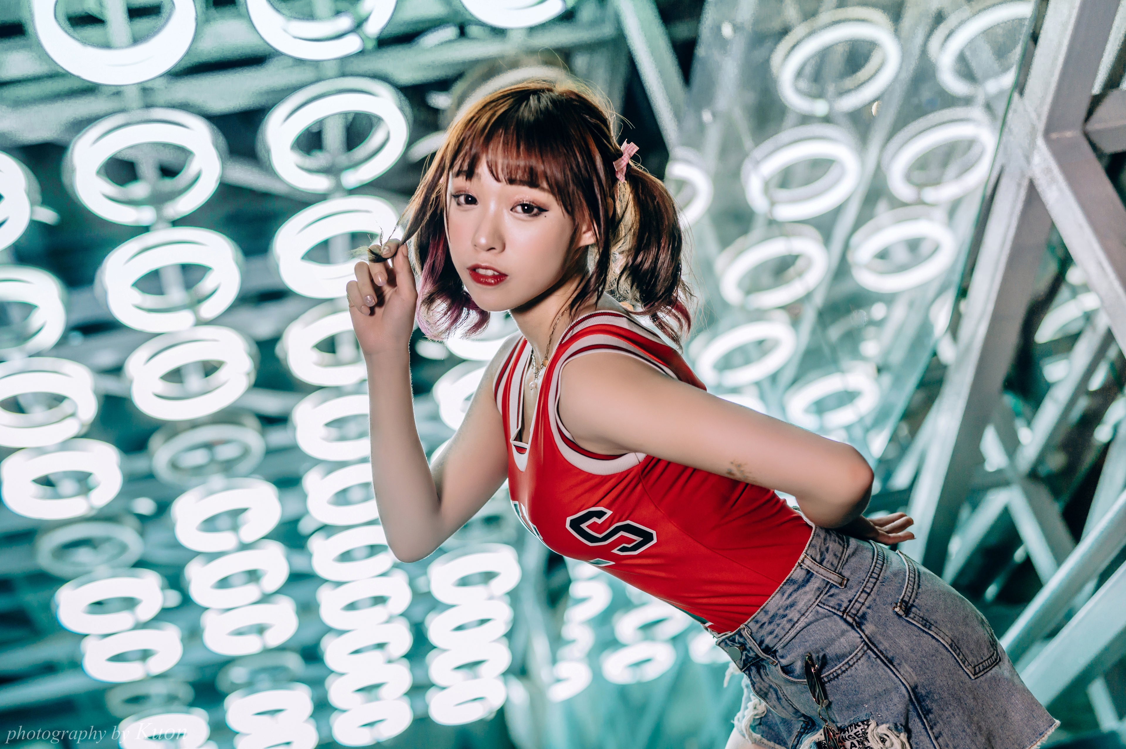 Asian woman with pigtails in red top and denim shorts HD Wallpaper
