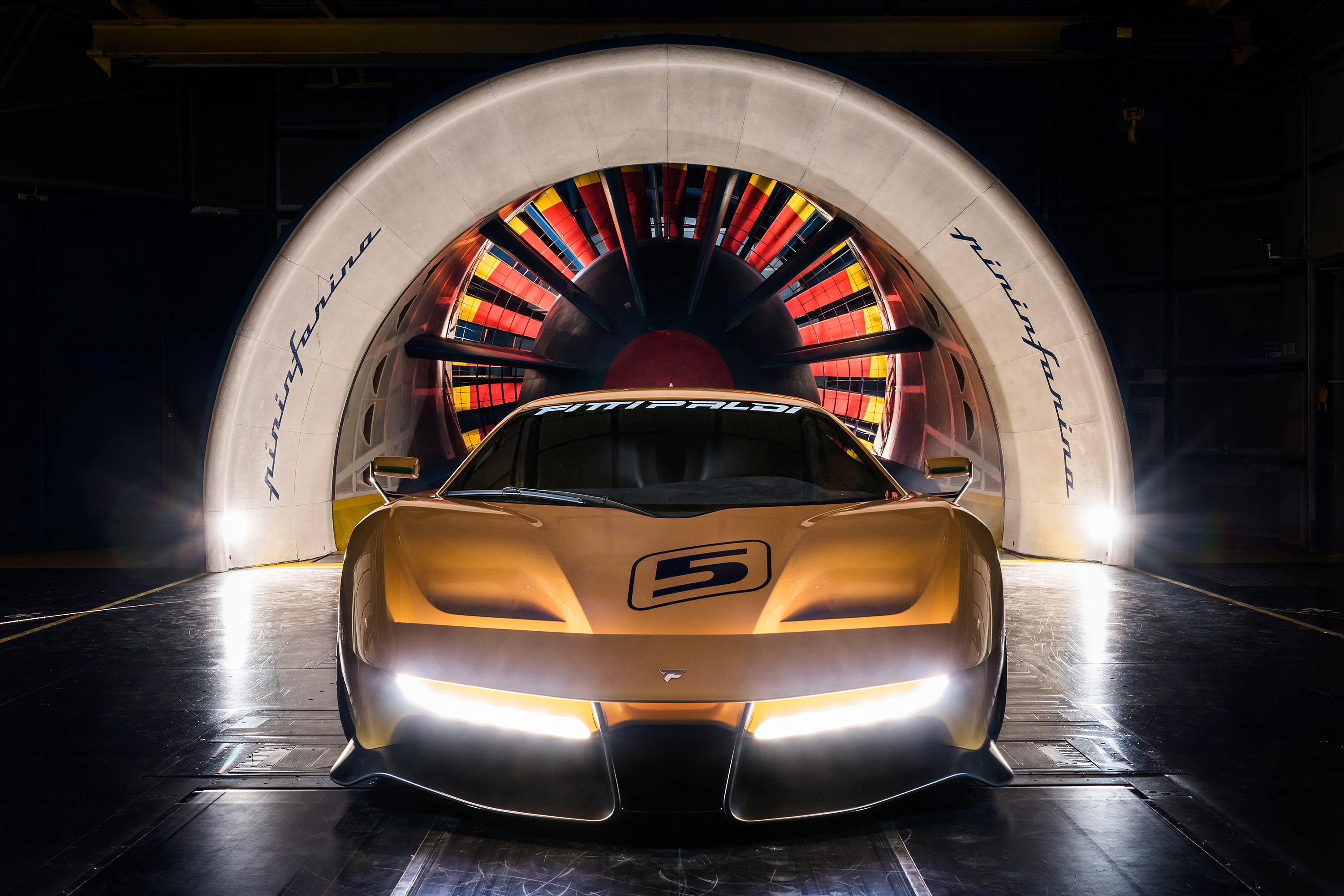 Fittipaldi EF7 race car in wind tunnel HD Wallpaper