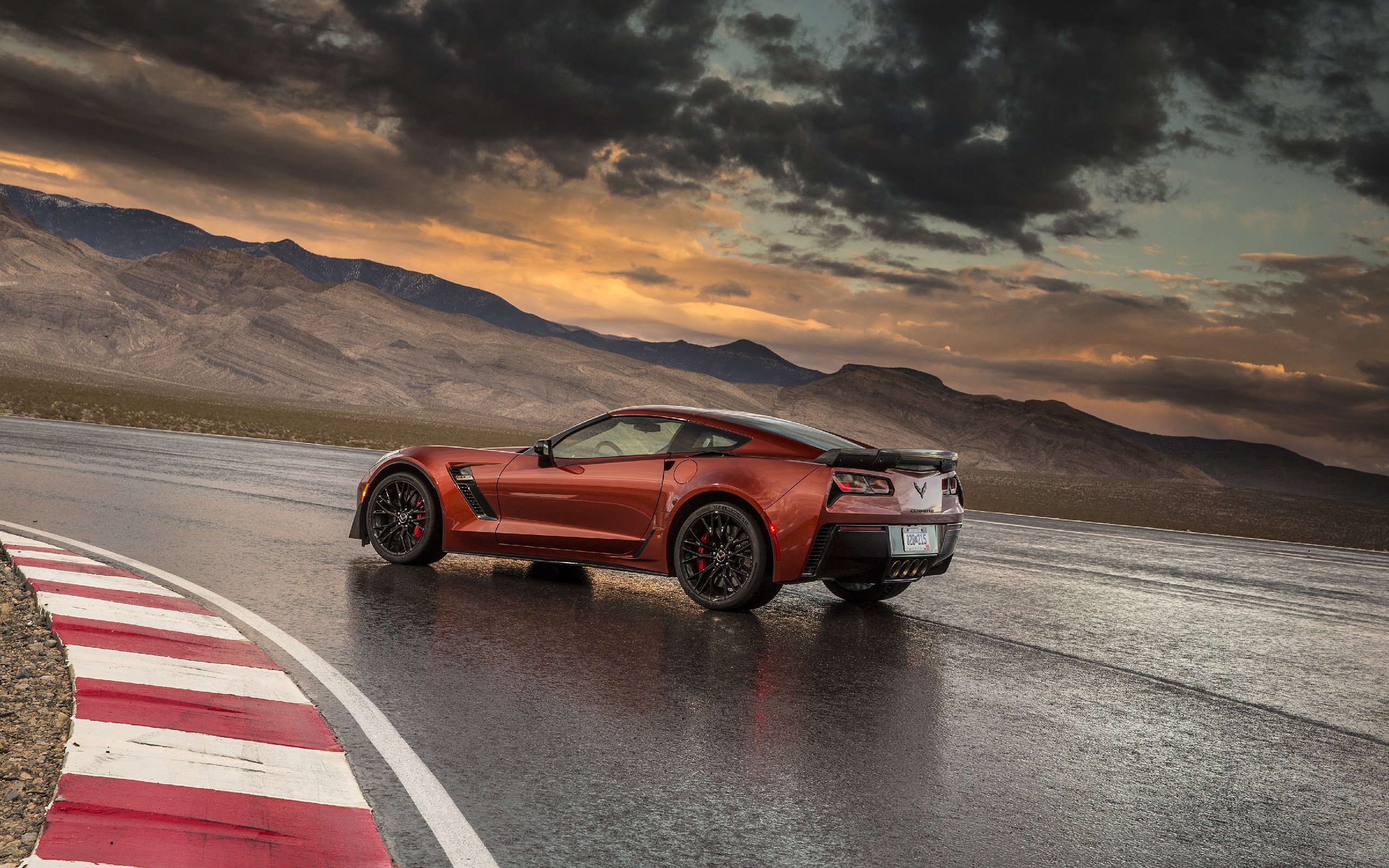 2015 Chevrolet Corvette Z06 on a wet race track HD Wallpaper