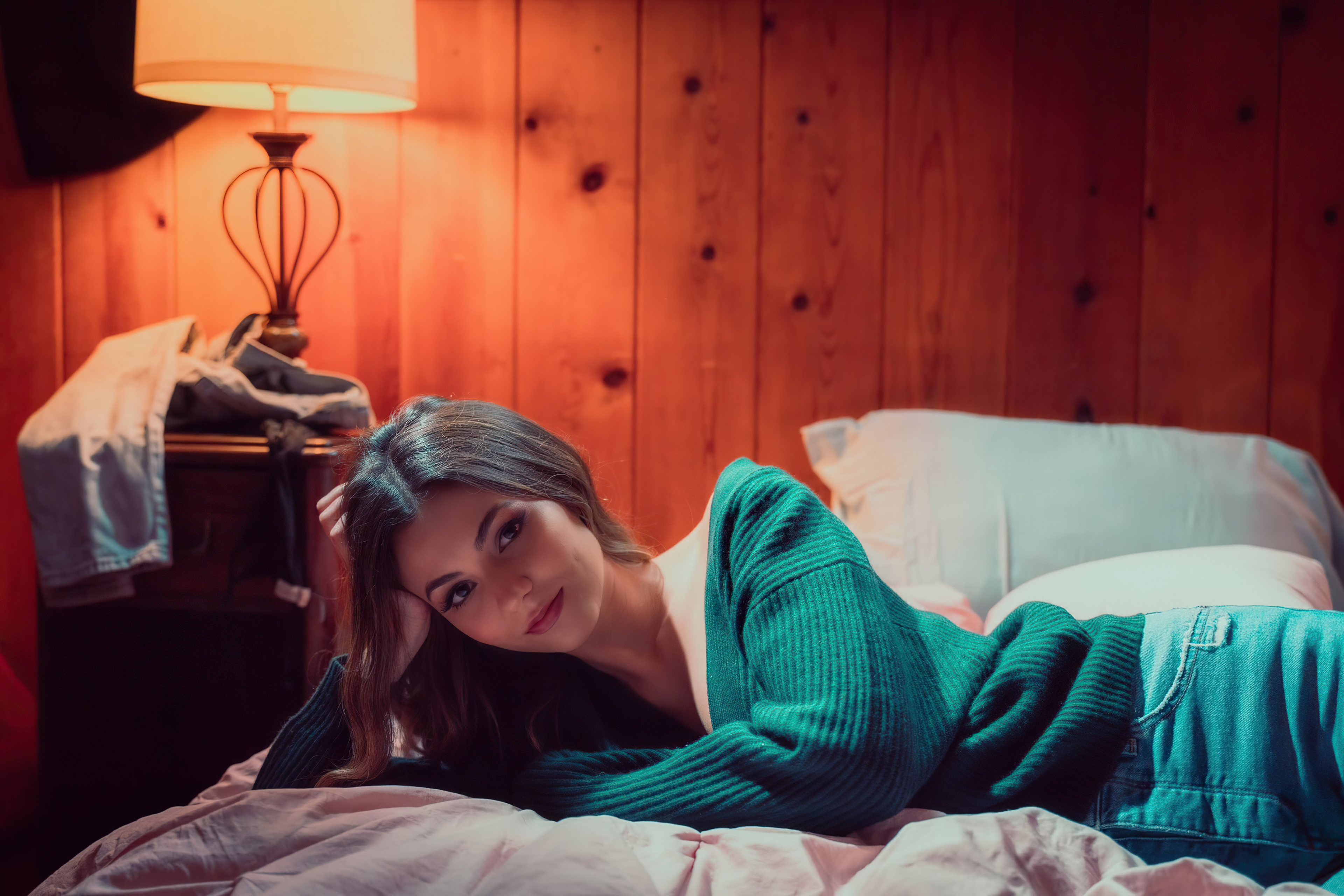 Victoria Justice in a green sweater and jeans HD Wallpaper