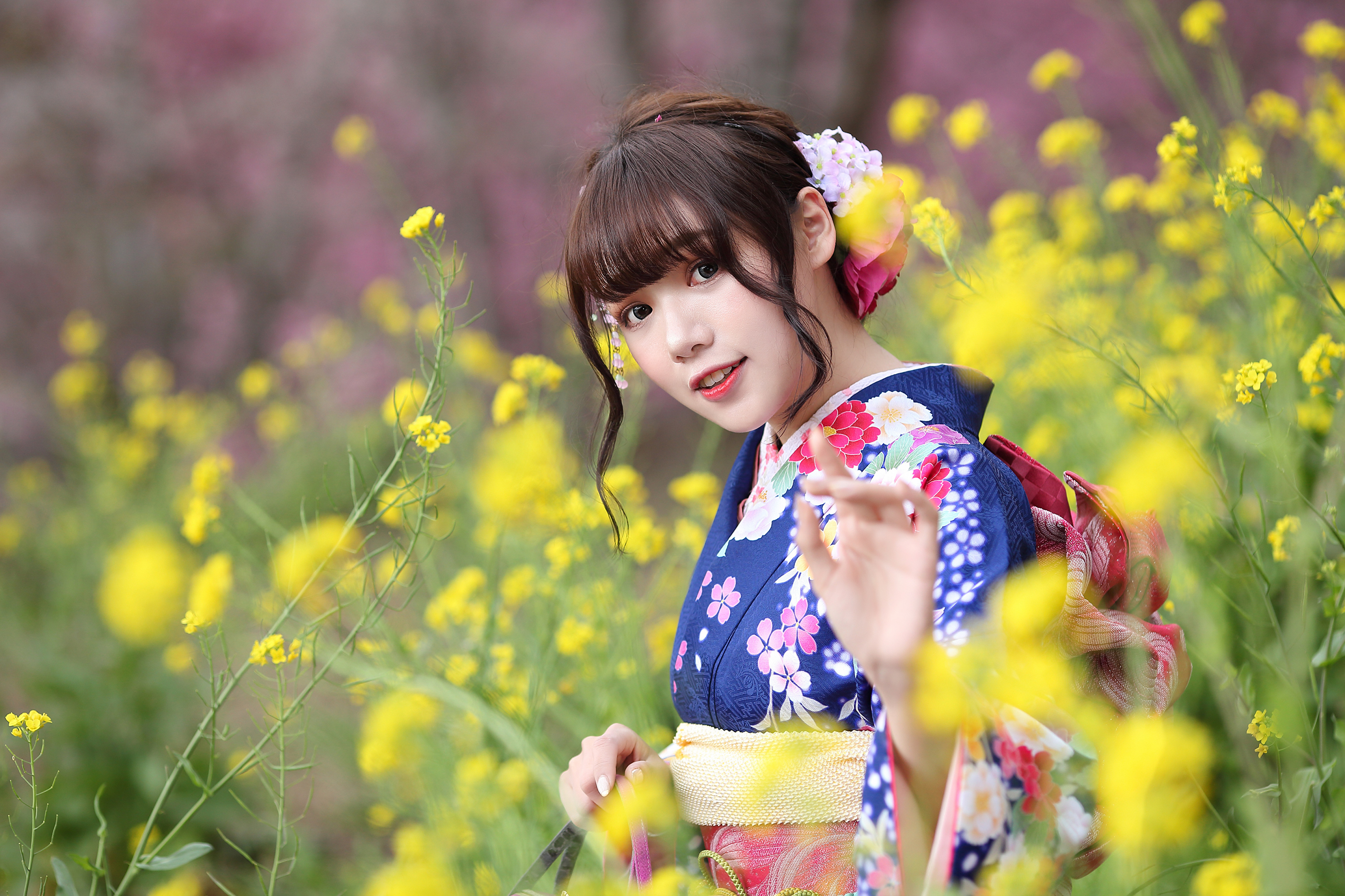 Woman in Kimono among yellow flowers HD Wallpaper