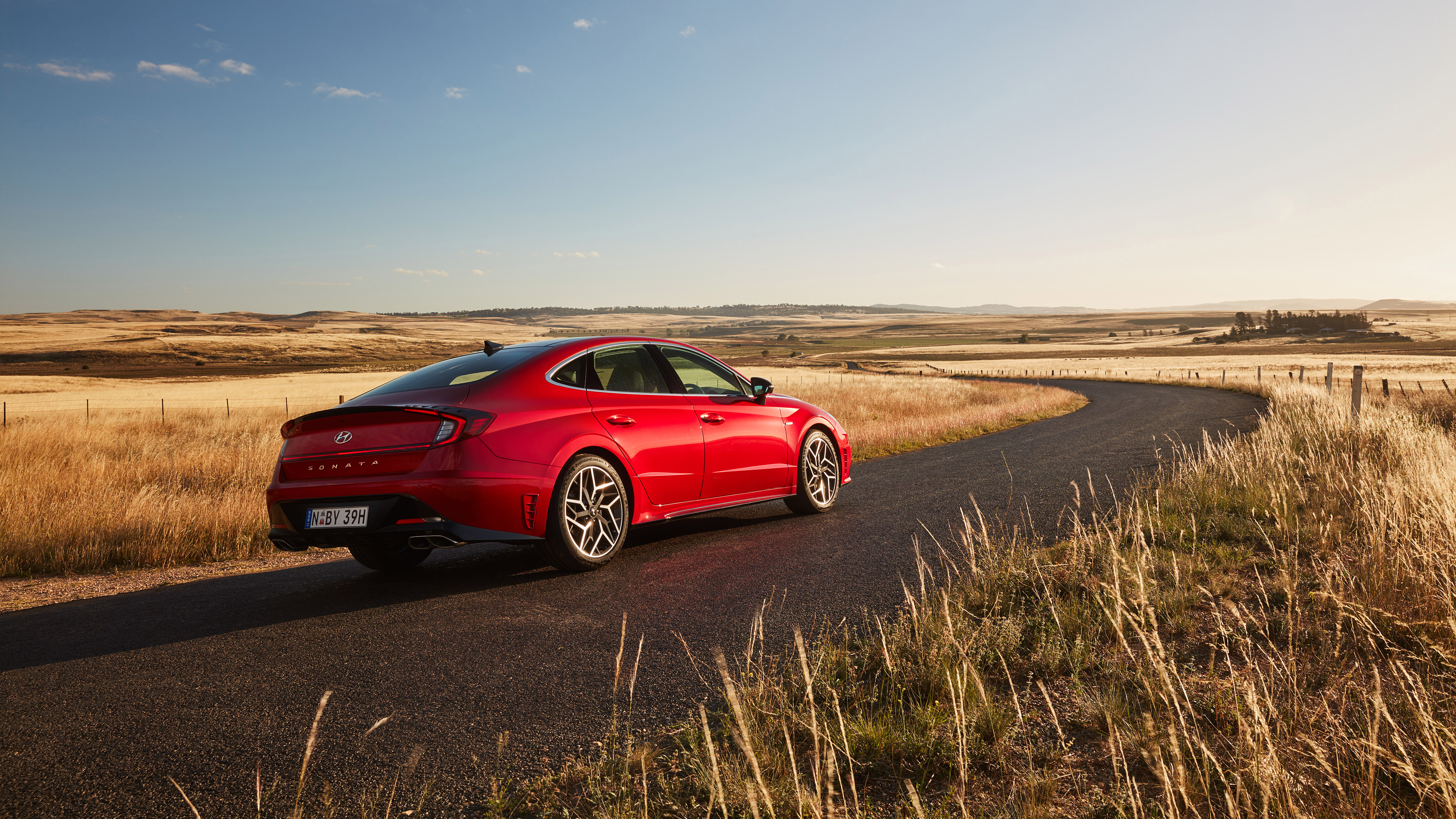 Red Hyundai Sonata N Line on a Country Road HD Wallpaper