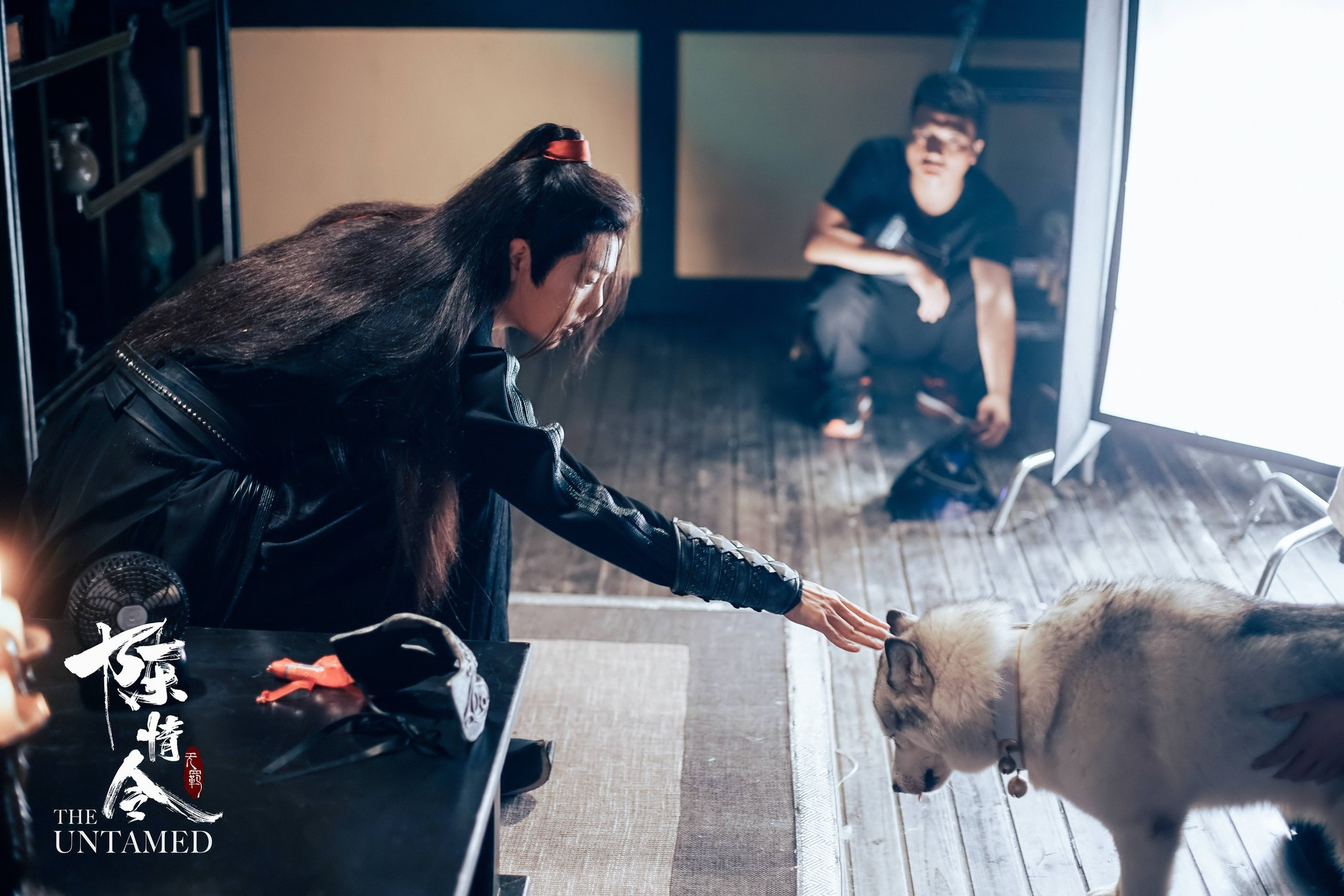 Wei Wuxian from The Untamed petting a dog HD Wallpaper