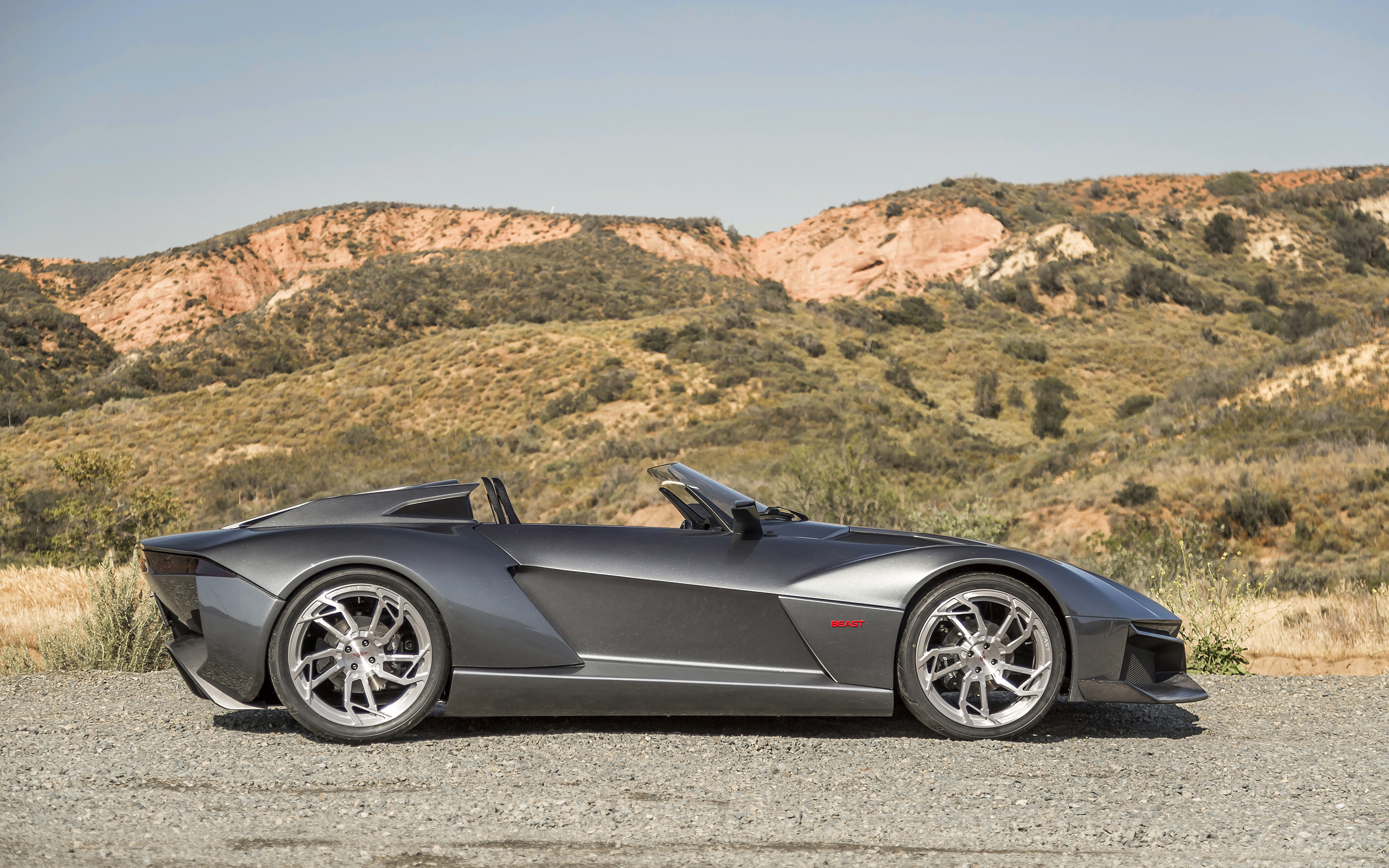 Rezvani Beast convertible car in a desert landscape HD Wallpaper