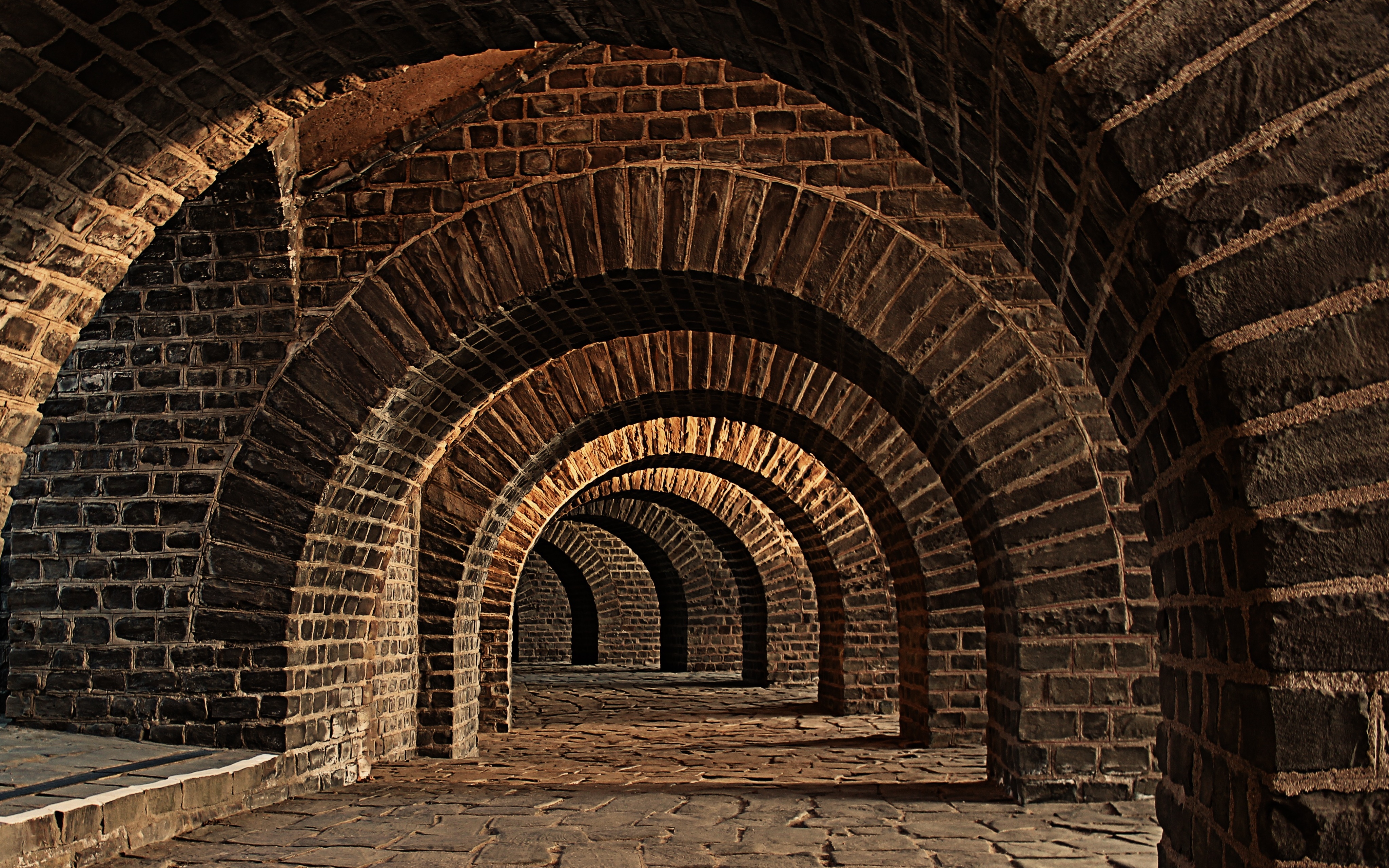 Brick arches in a tunnel HD Wallpaper