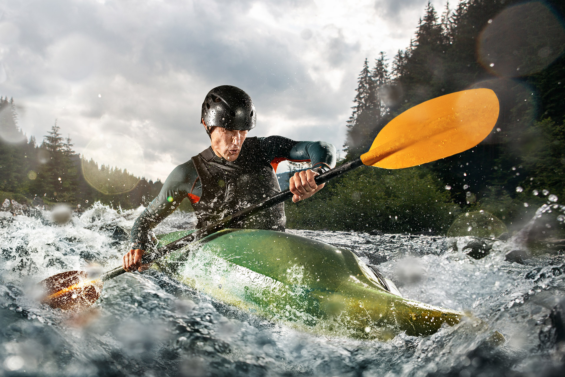 Man kayaking down a river HD Wallpaper