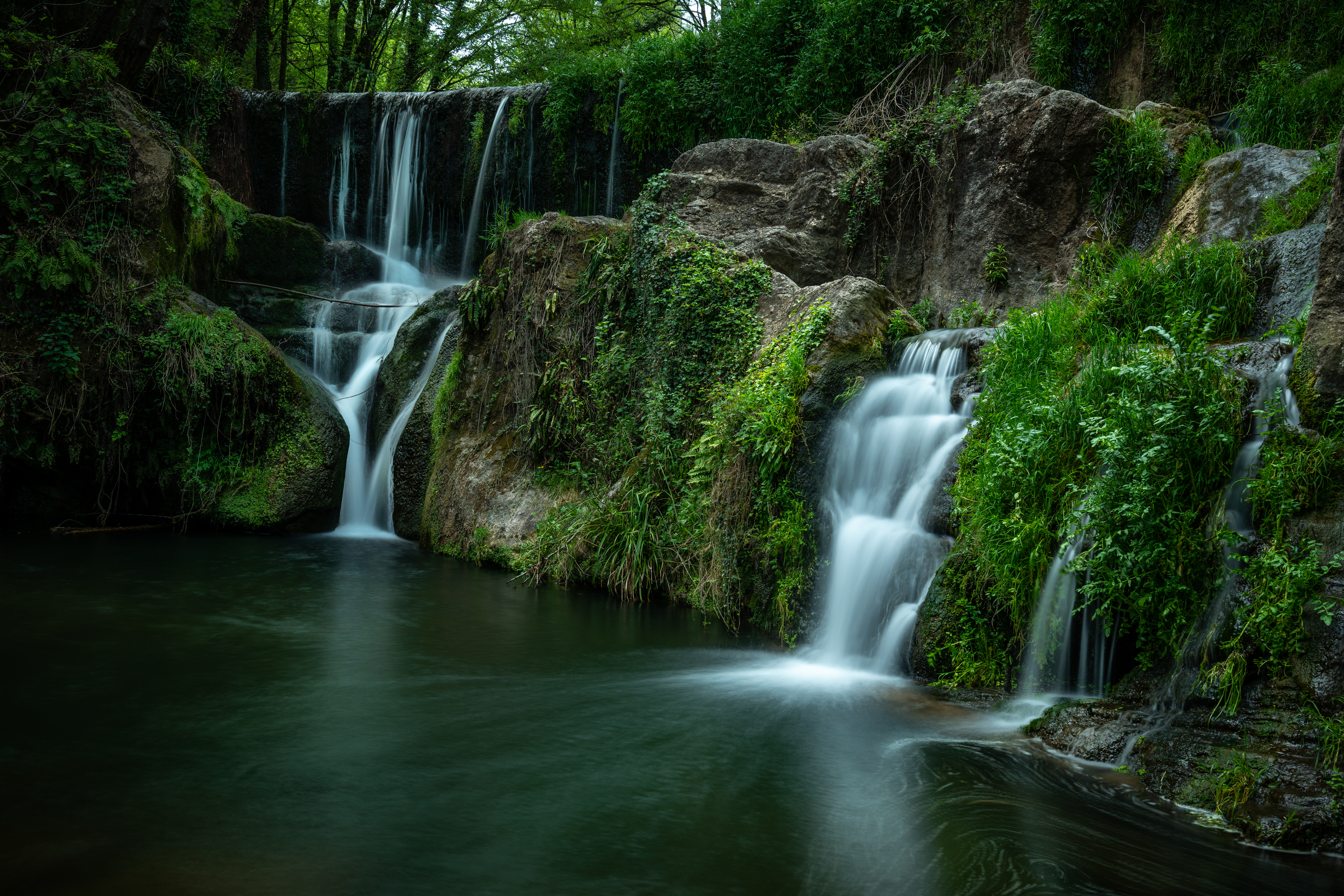 Secluded Waterfall in Spain with Moss and Greenery HD Wallpaper