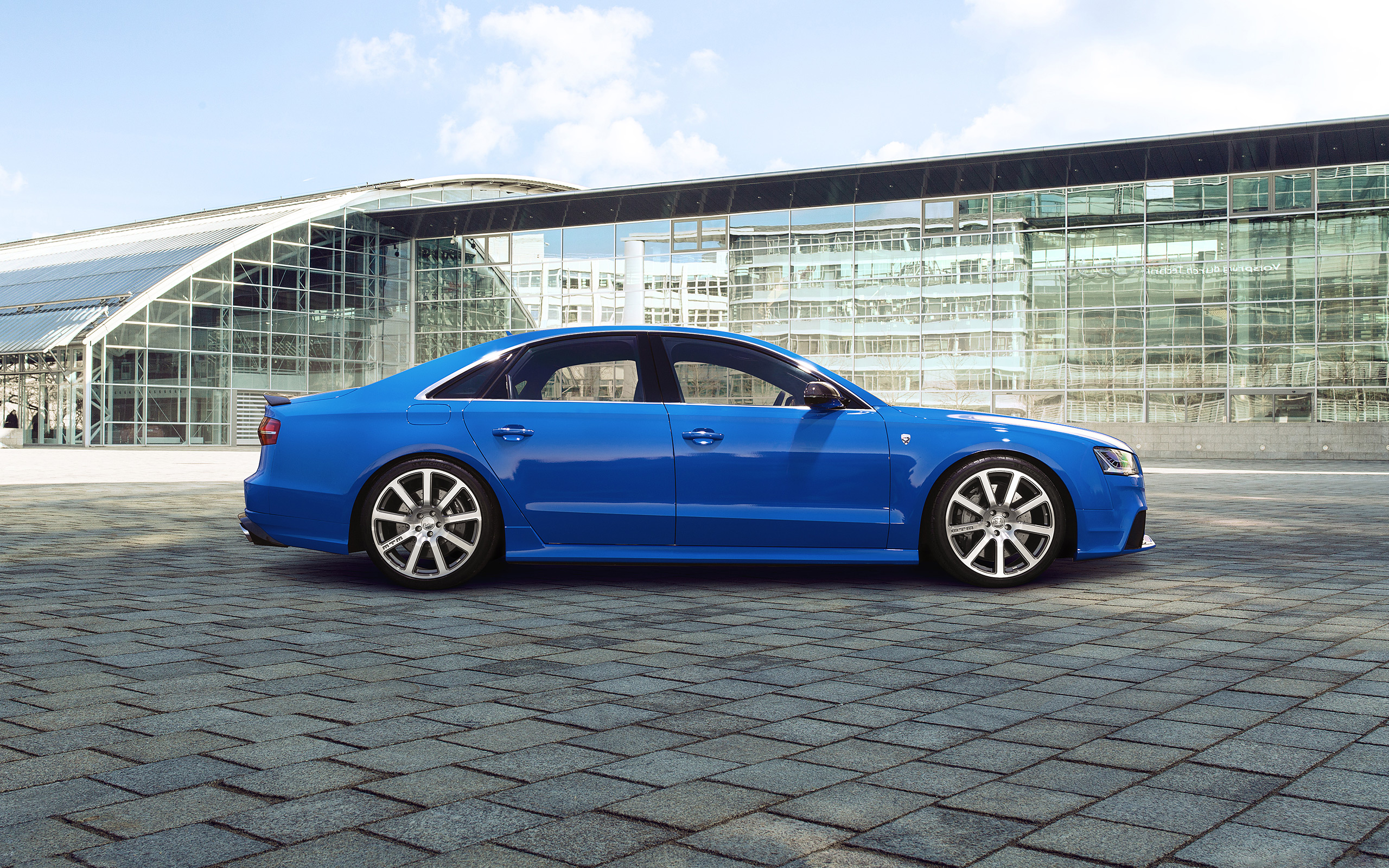 Blue Audi S8 Talladega S parked outside modern building HD Wallpaper