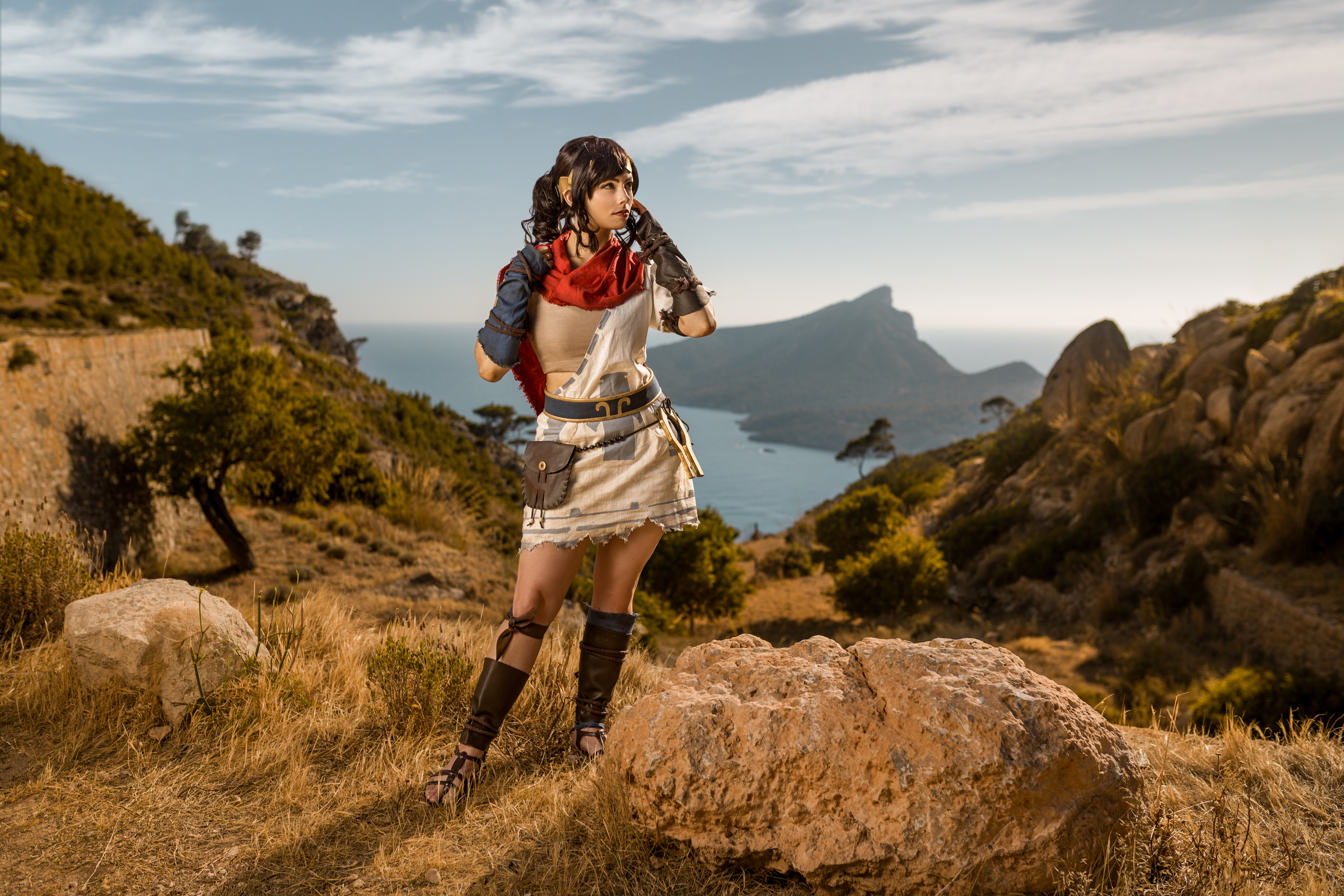 Woman in Cosplay on a Hillside HD Wallpaper
