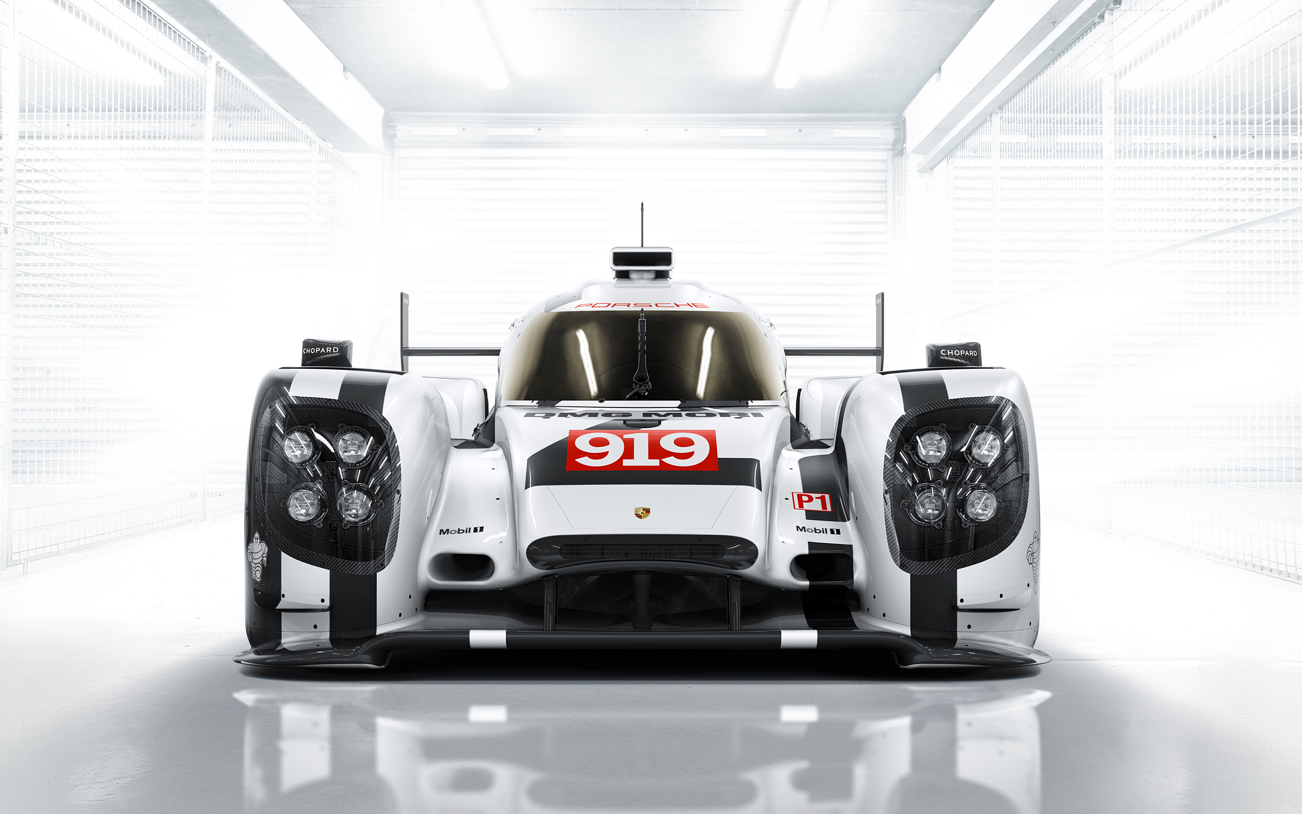 Porsche 919 Hybrid race car in a garage HD Wallpaper