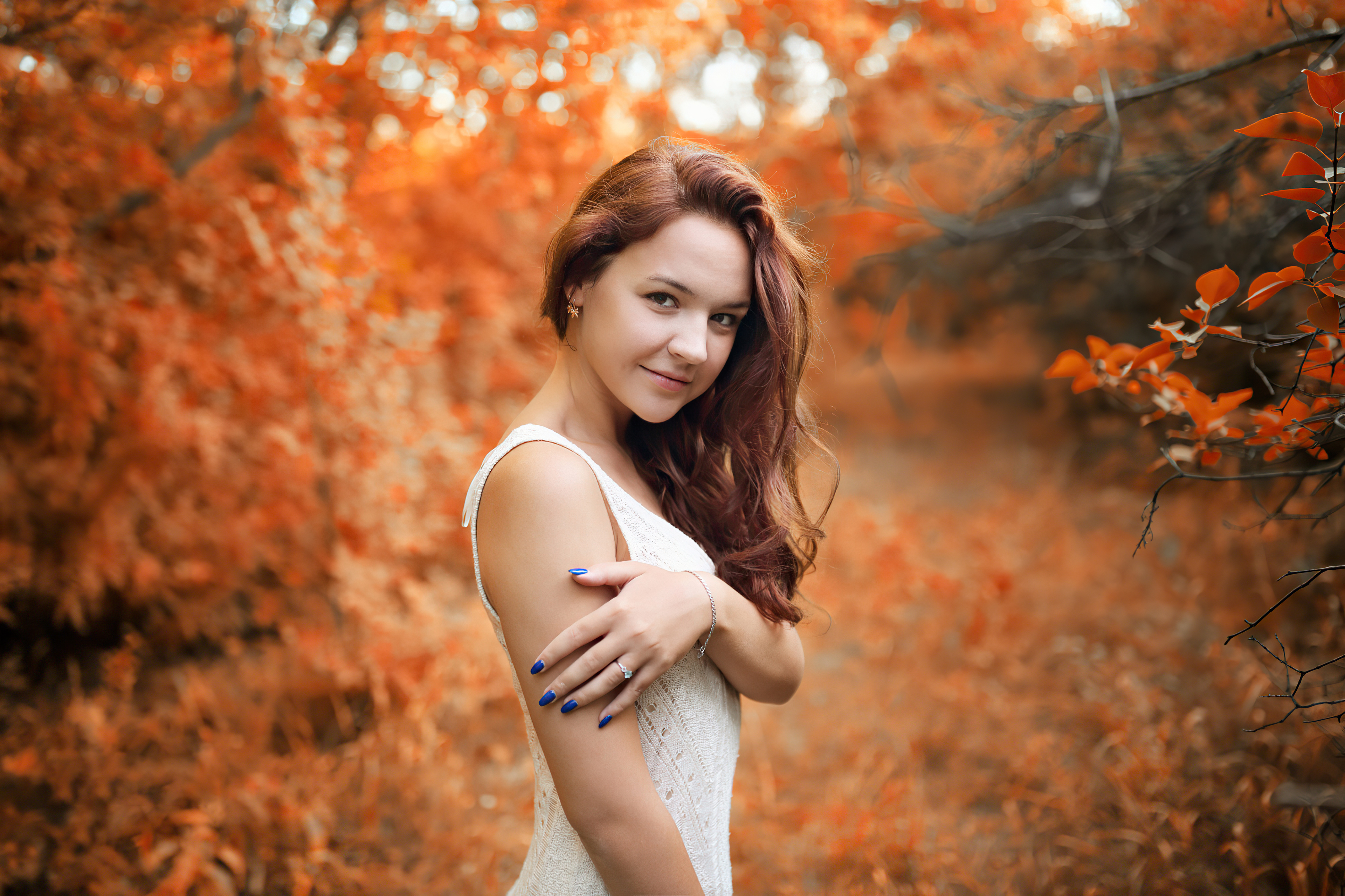Woman in white dress in autumn forest HD Wallpaper