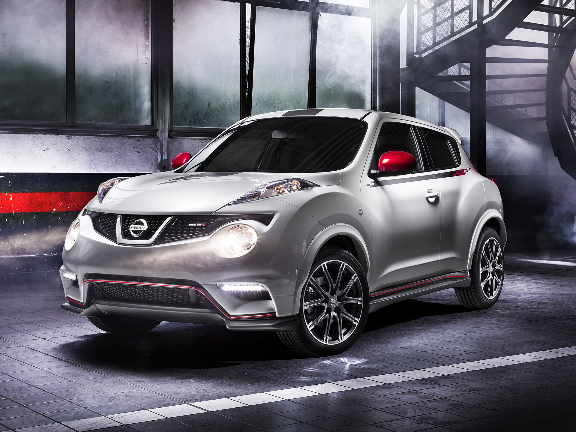 Silver Nissan Juke Nismo parked indoors HD Wallpaper
