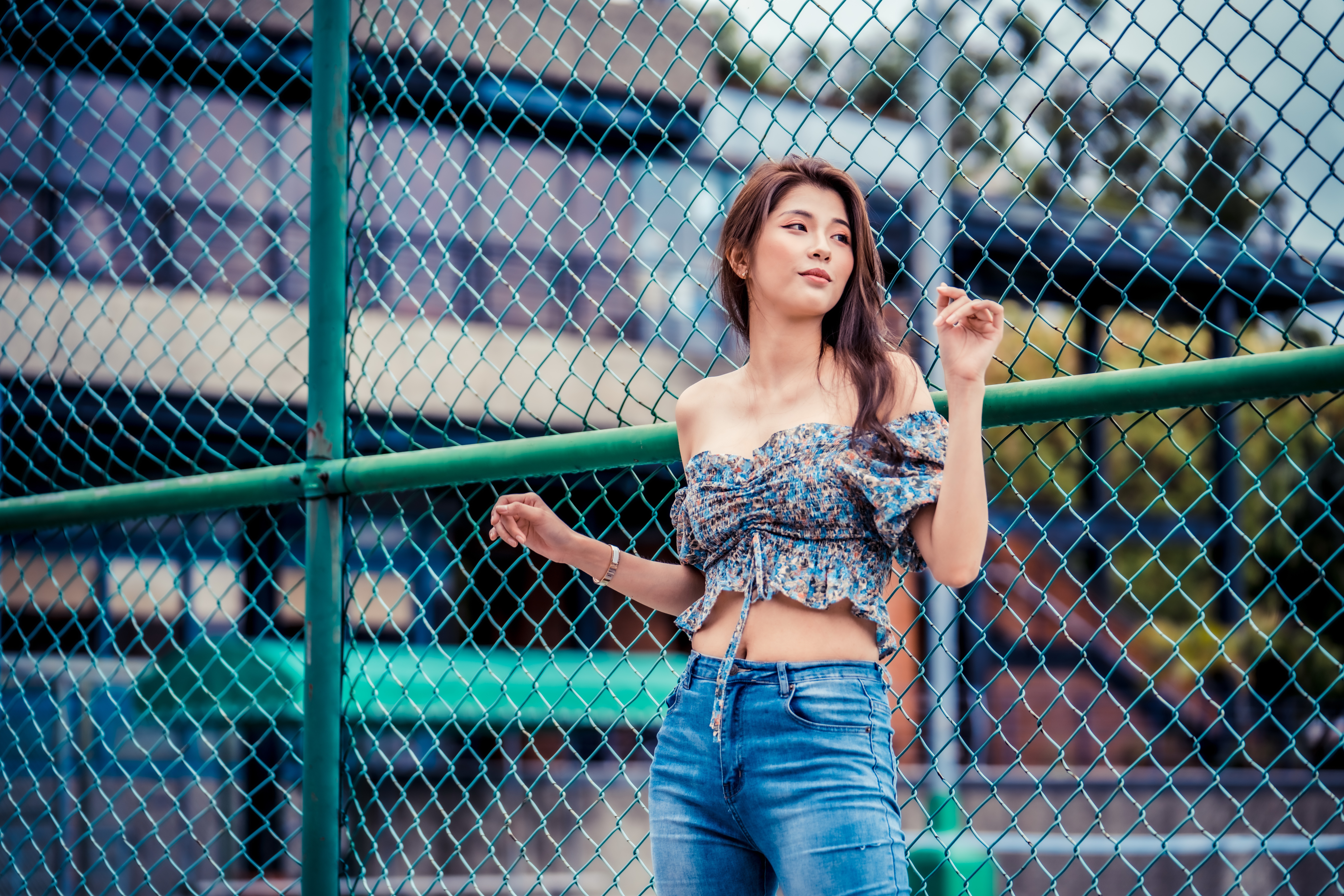 Asian woman in off-the-shoulder top and jeans HD Wallpaper