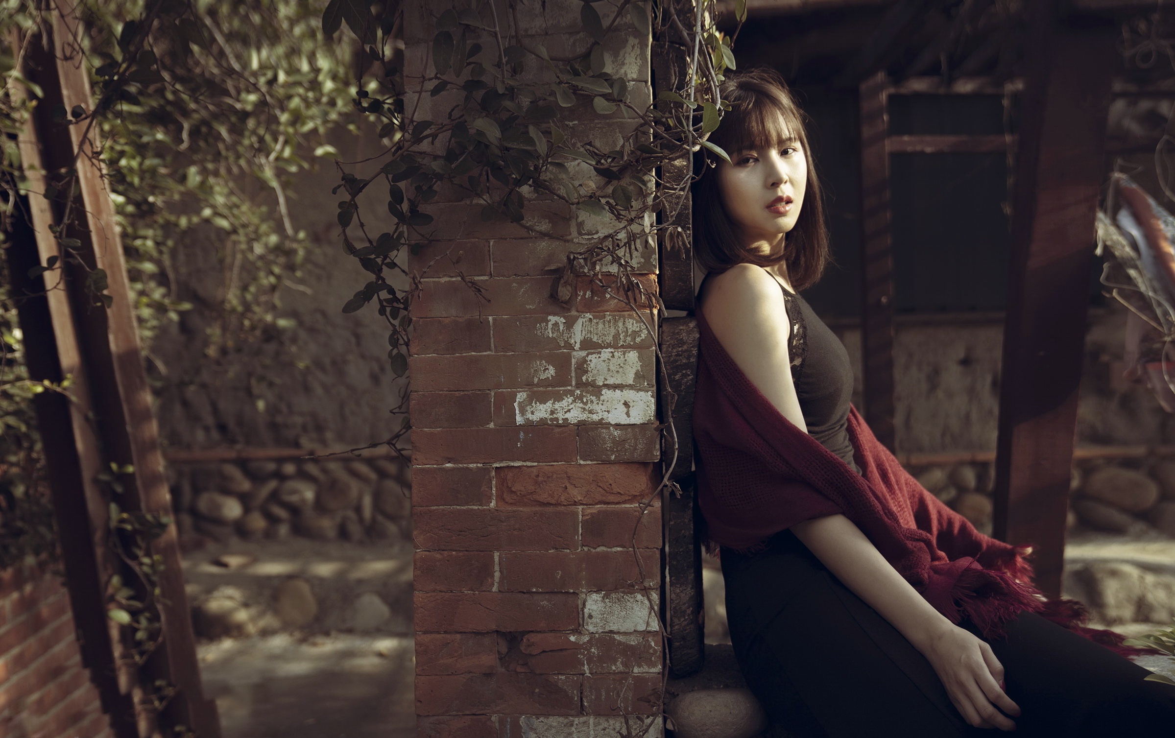Asian woman in a black dress with a red shawl HD Wallpaper