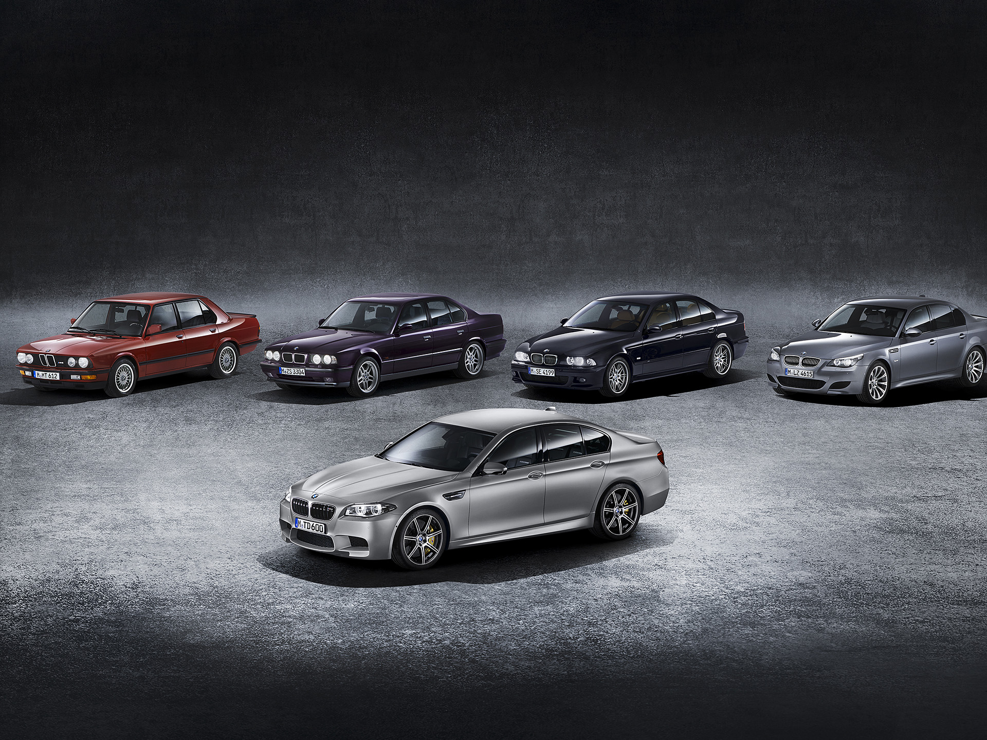 BMW M5 Generations: Red, Purple, Blue, and Gray Sedans HD Wallpaper