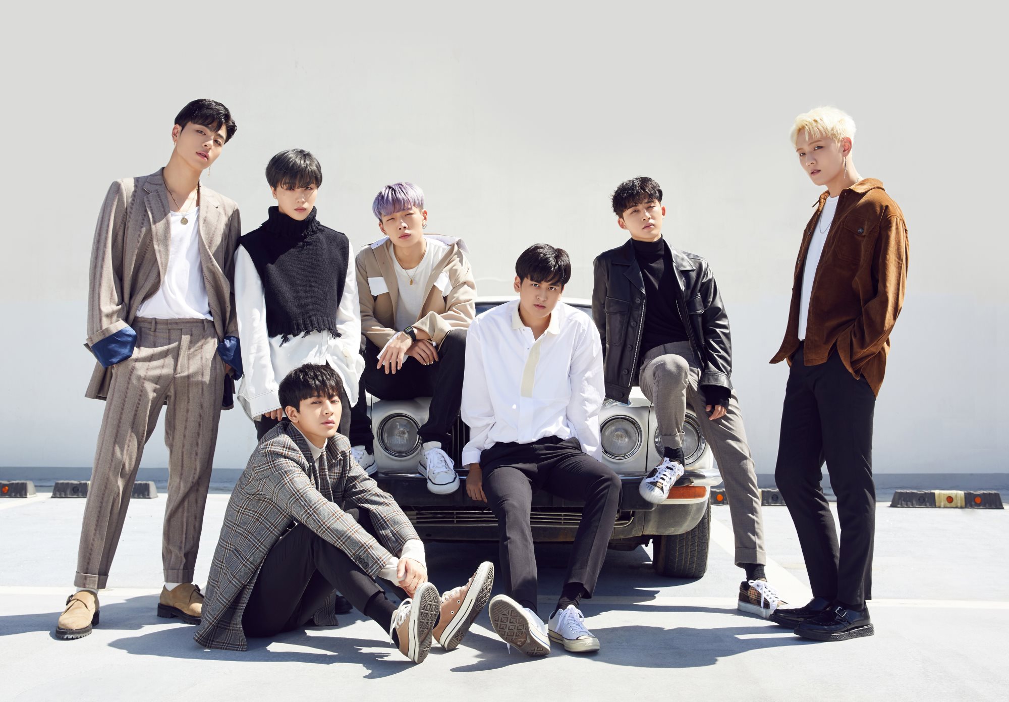 iKON members posing in front of a car HD Wallpaper
