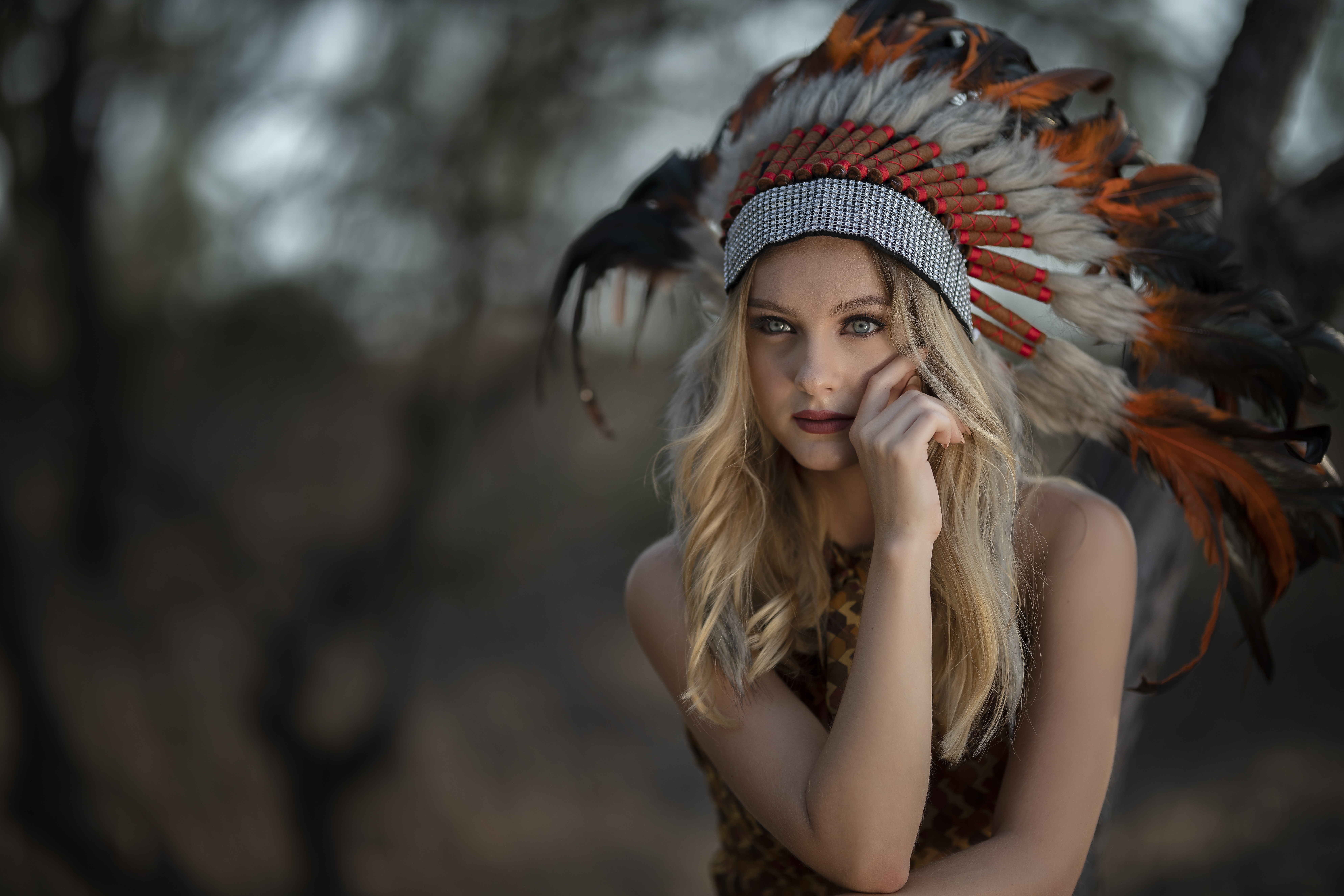 Woman with Blonde Hair and Feather Headdress HD Wallpaper