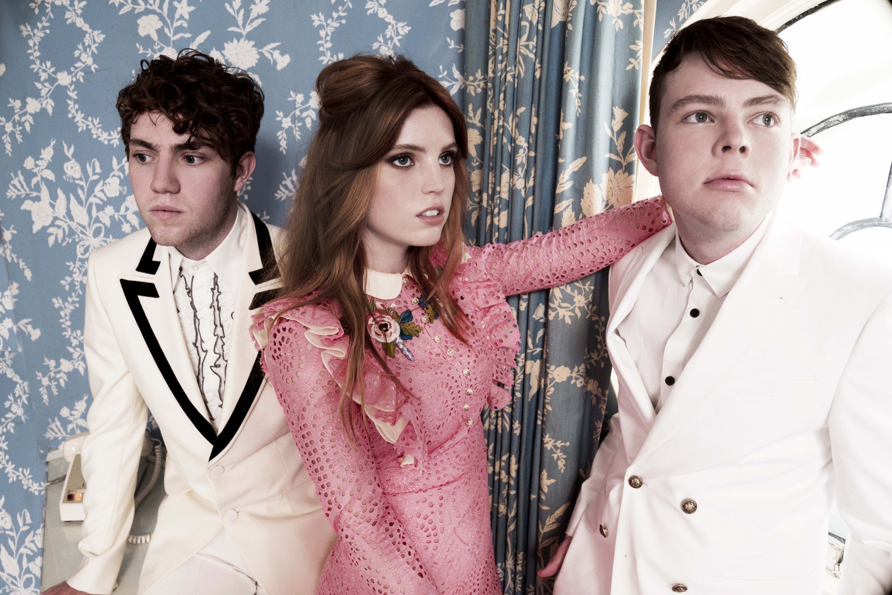 Echosmith band members in formal attire HD Wallpaper