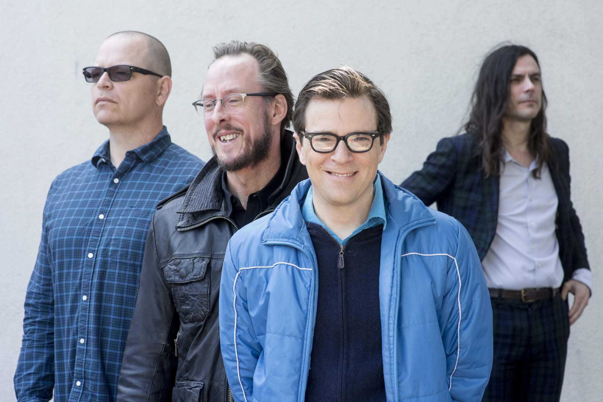 Weezer band members posing for a photo HD Wallpaper
