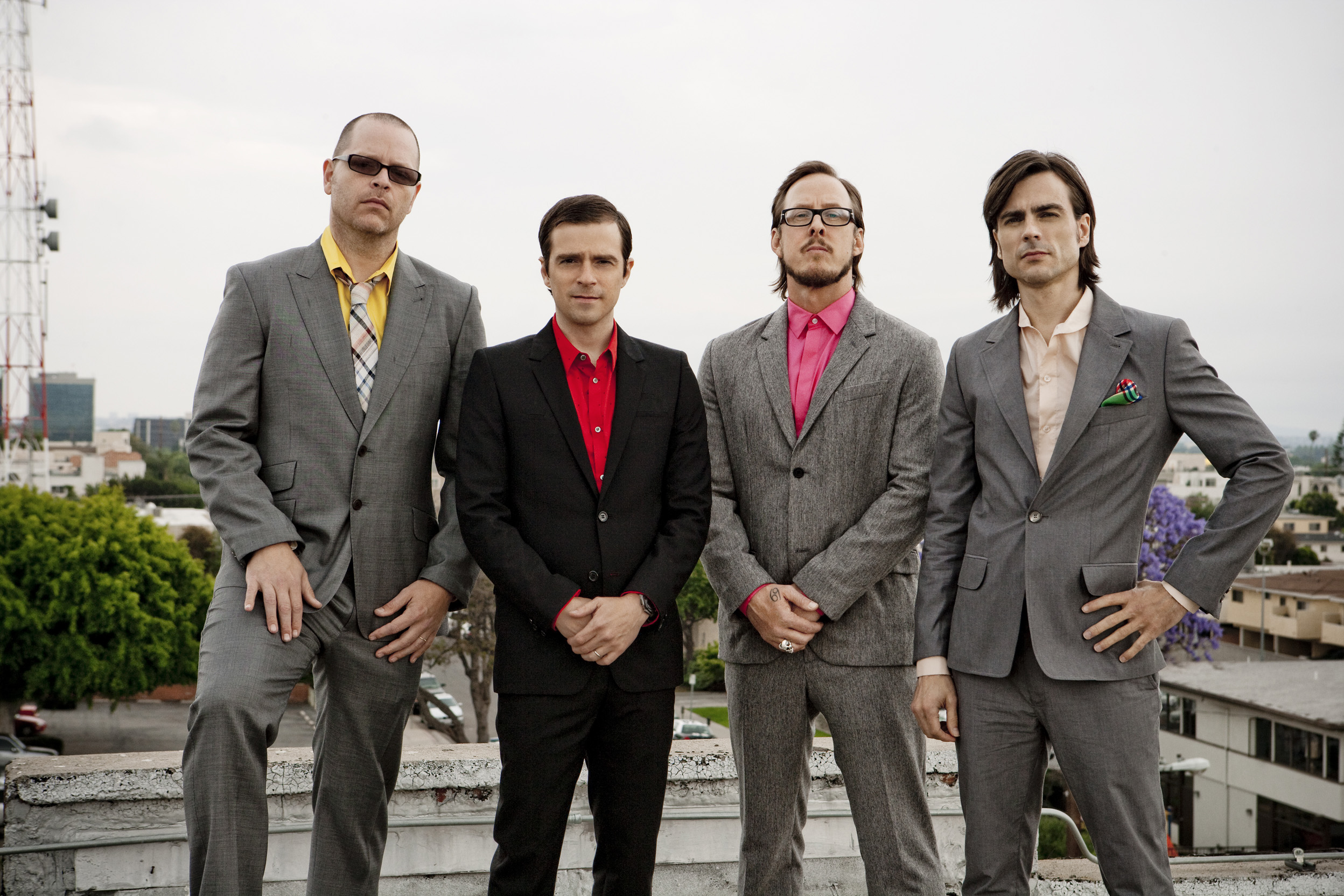 Weezer band members on a rooftop HD Wallpaper