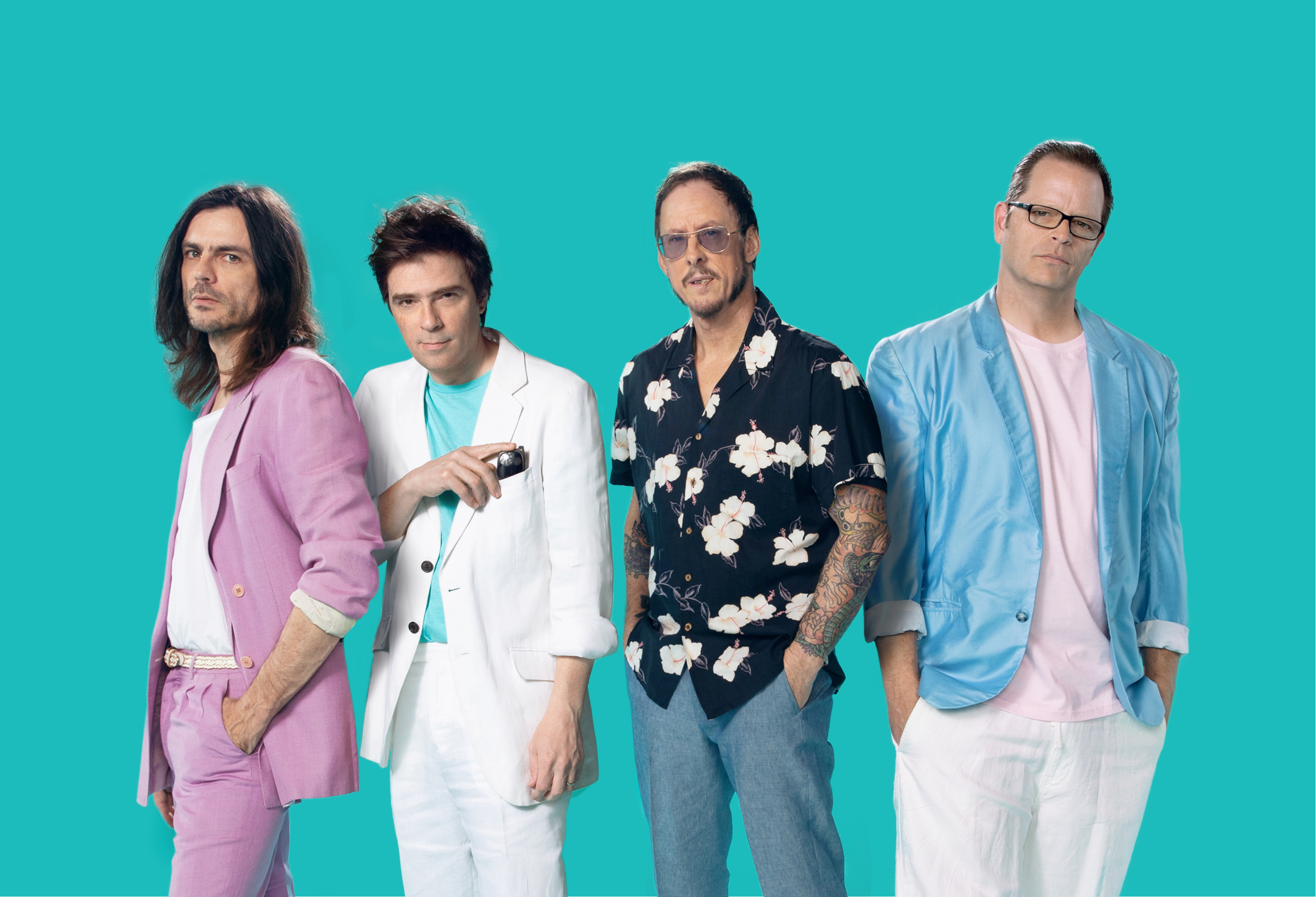 Weezer band members posing against a teal background HD Wallpaper