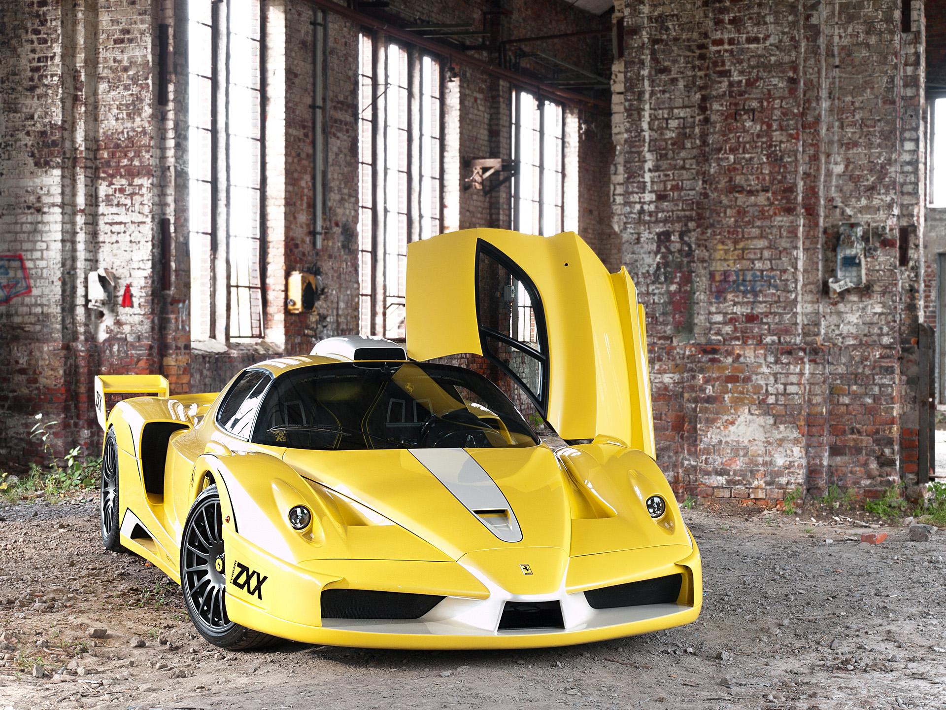 Yellow Edo Competition ZXX sports car in abandoned building HD Wallpaper