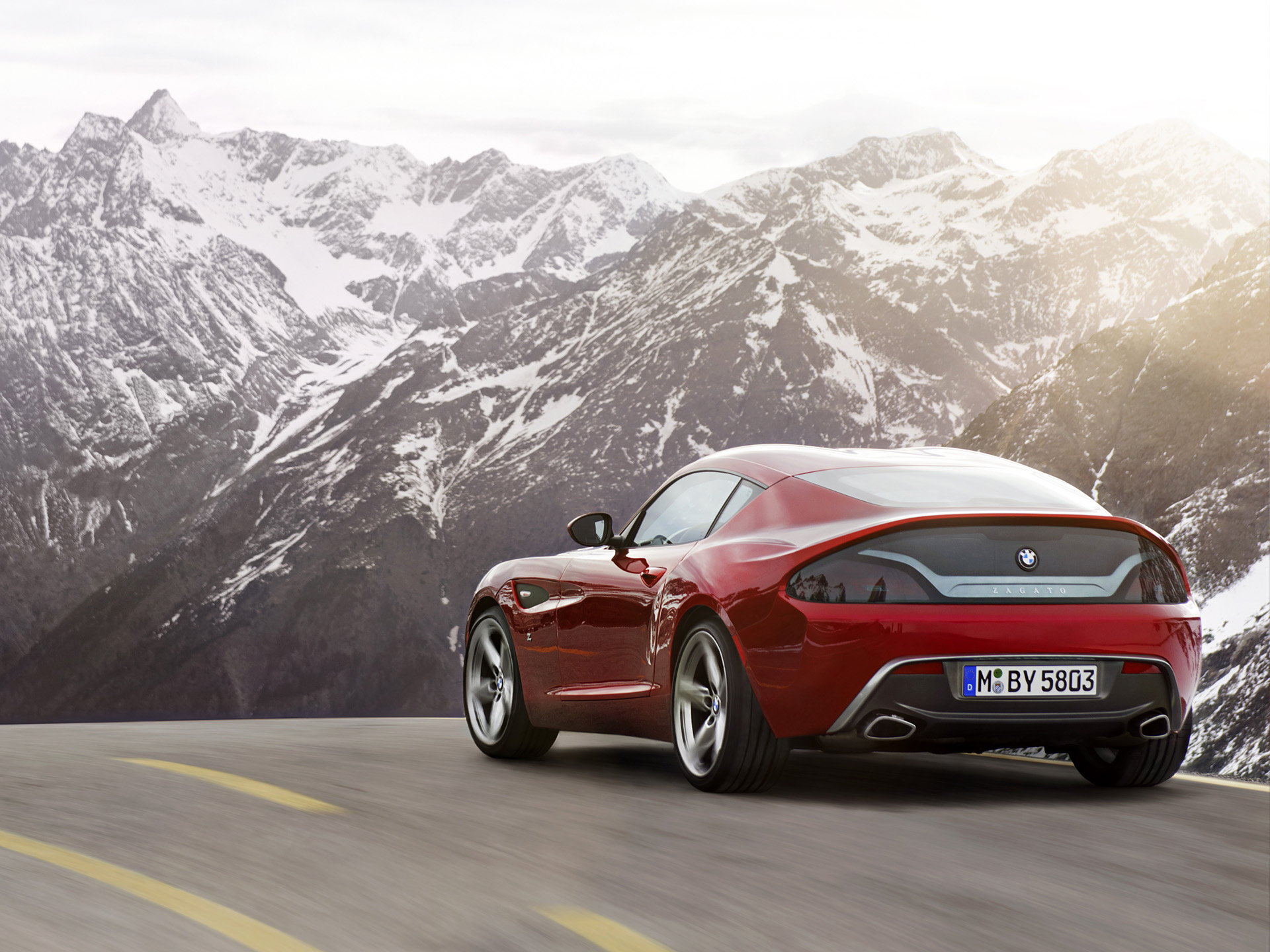 Red BMW Zagato Coupe Concept car on mountain road HD Wallpaper