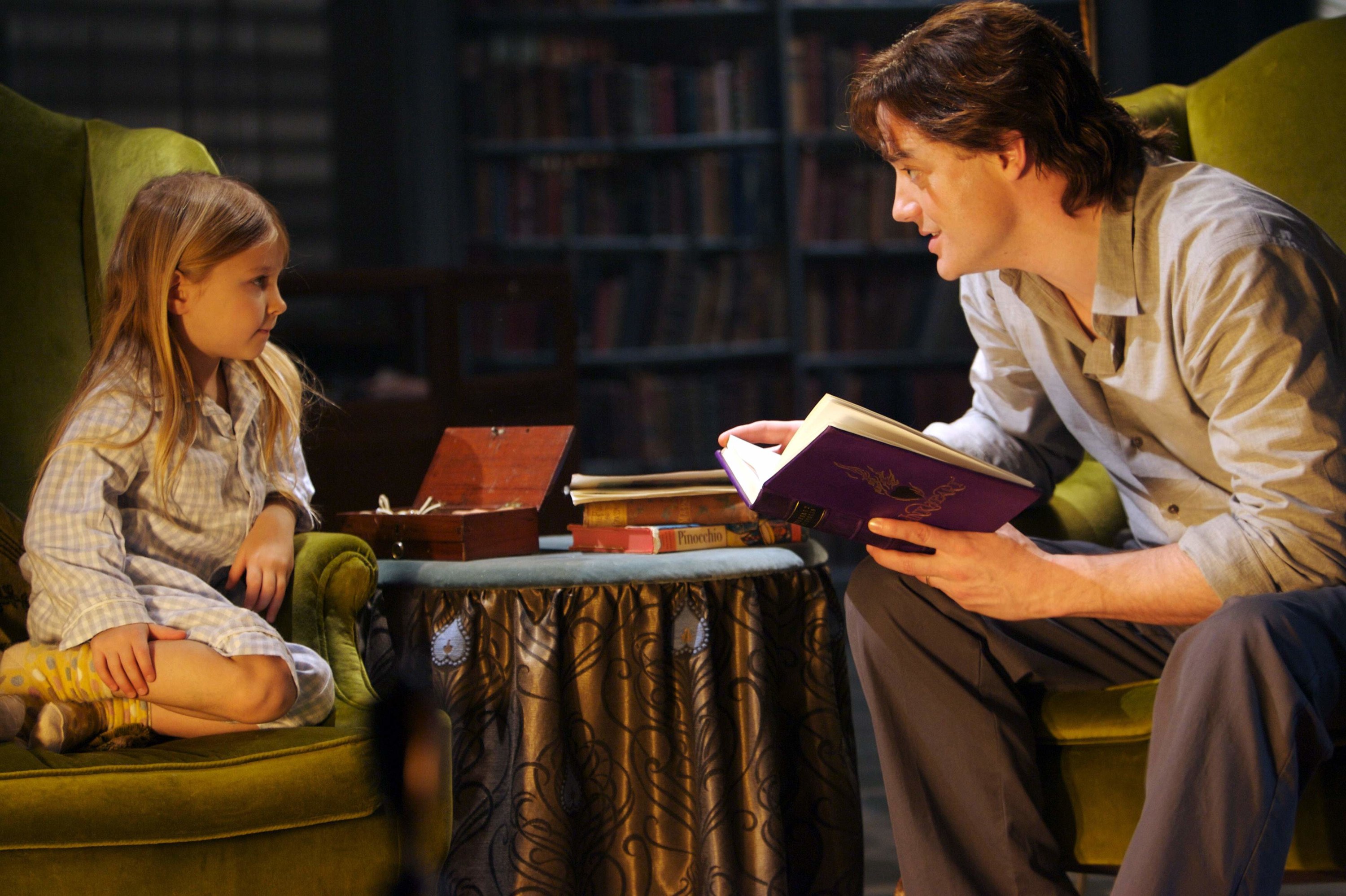 Mortimer and Meggie Folchart reading a book HD Wallpaper