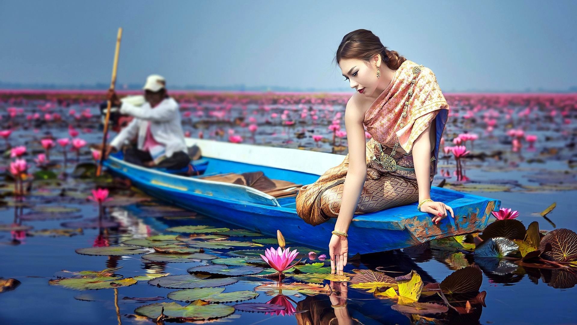 Asian Woman on Boat in Lotus Pond HD Wallpaper