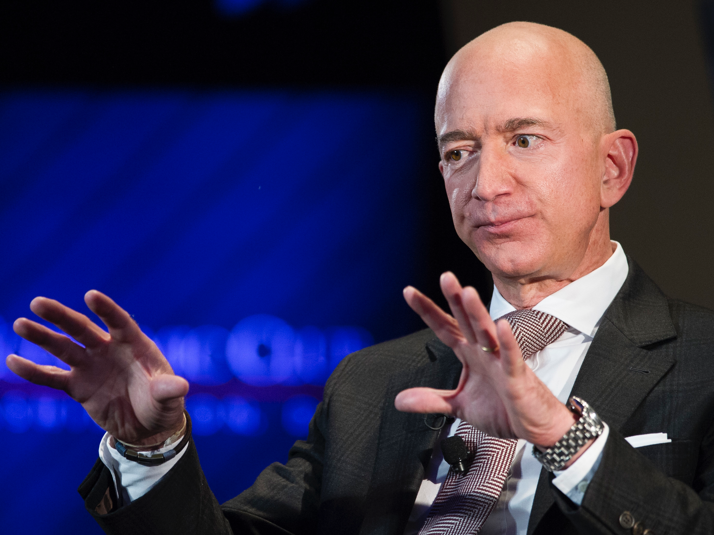 Jeff Bezos speaking at an event HD Wallpaper