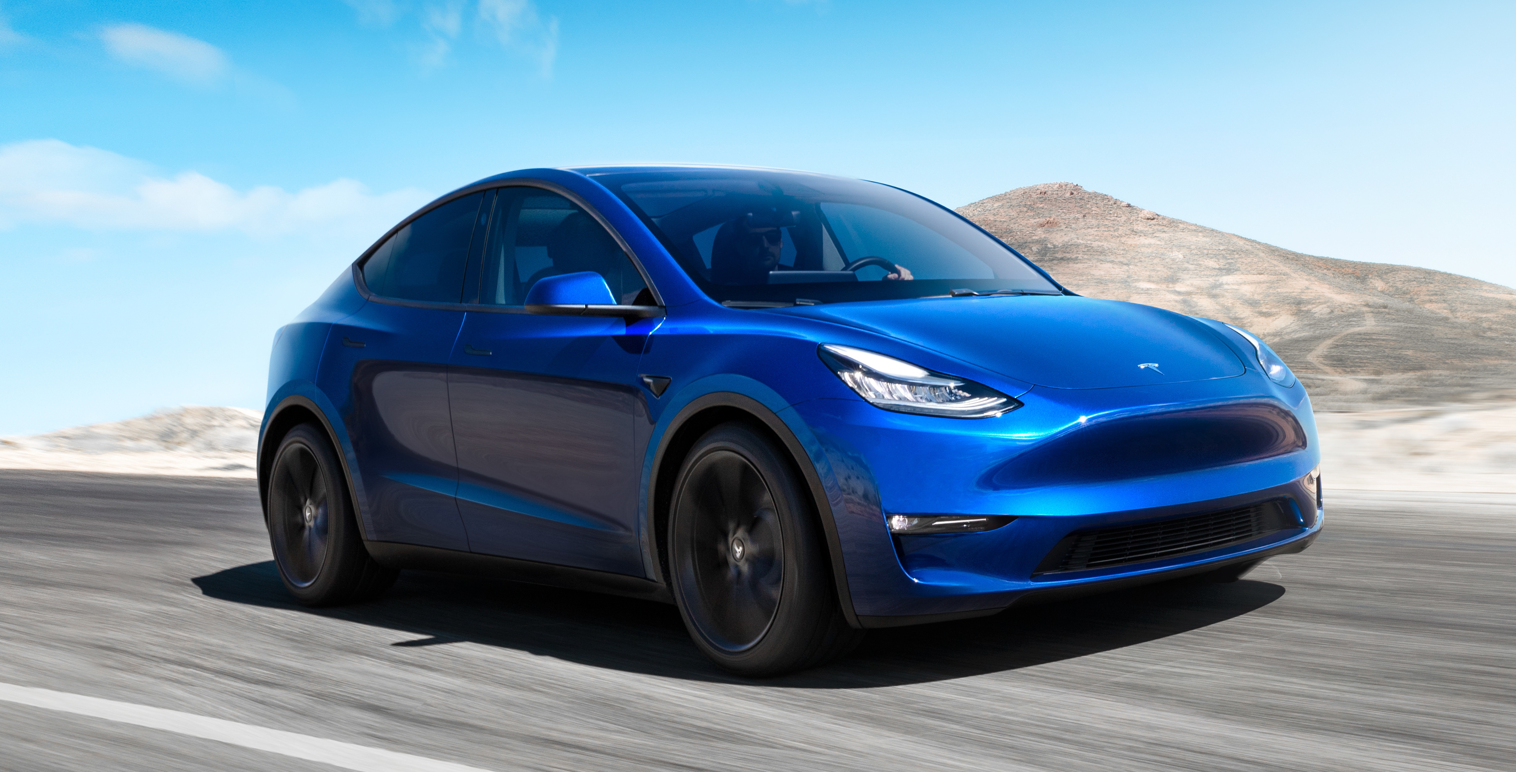 Blue Tesla Model Y Electric Car Driving HD Wallpaper