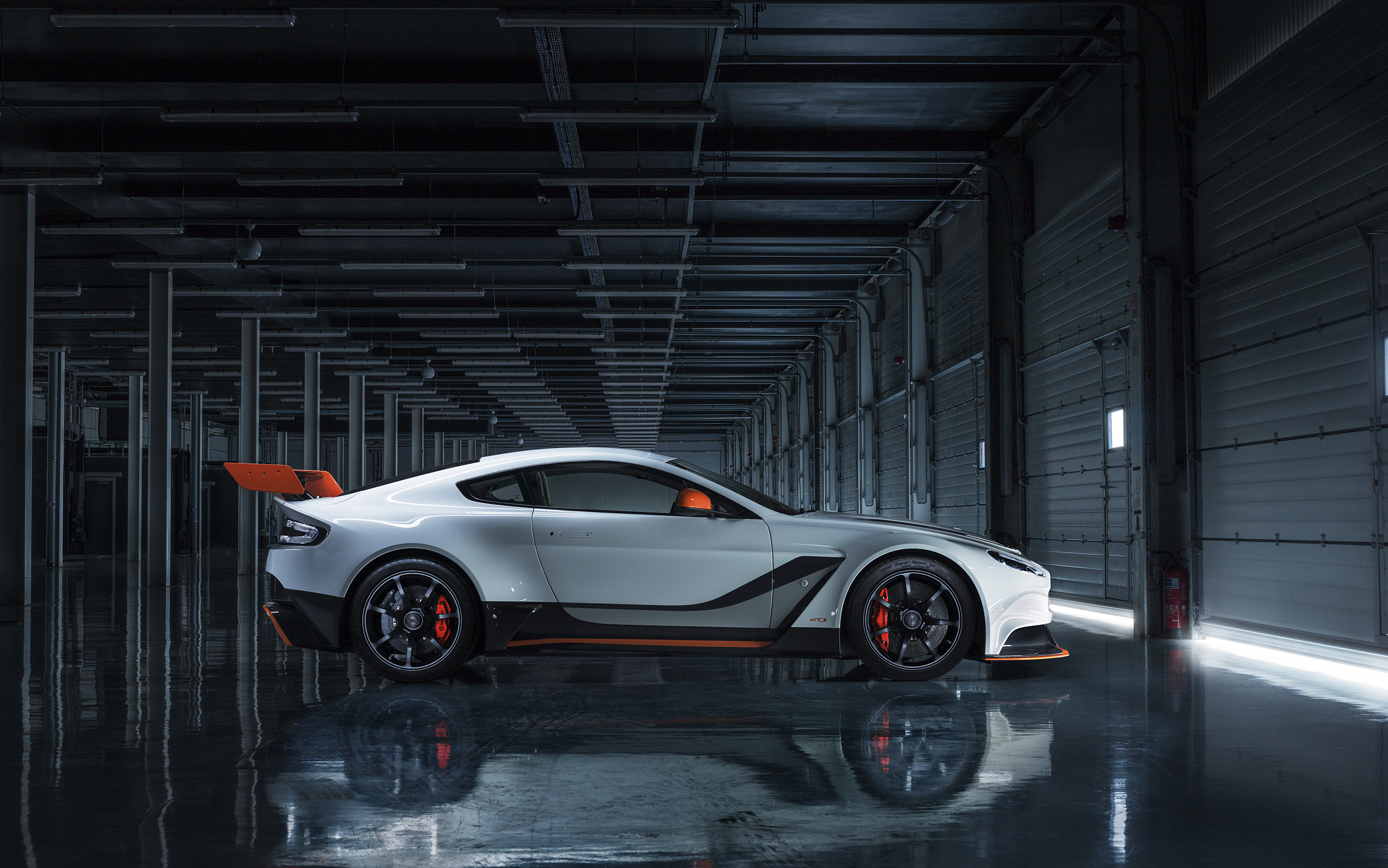 White Aston Martin Vantage GT12 with orange accents HD Wallpaper