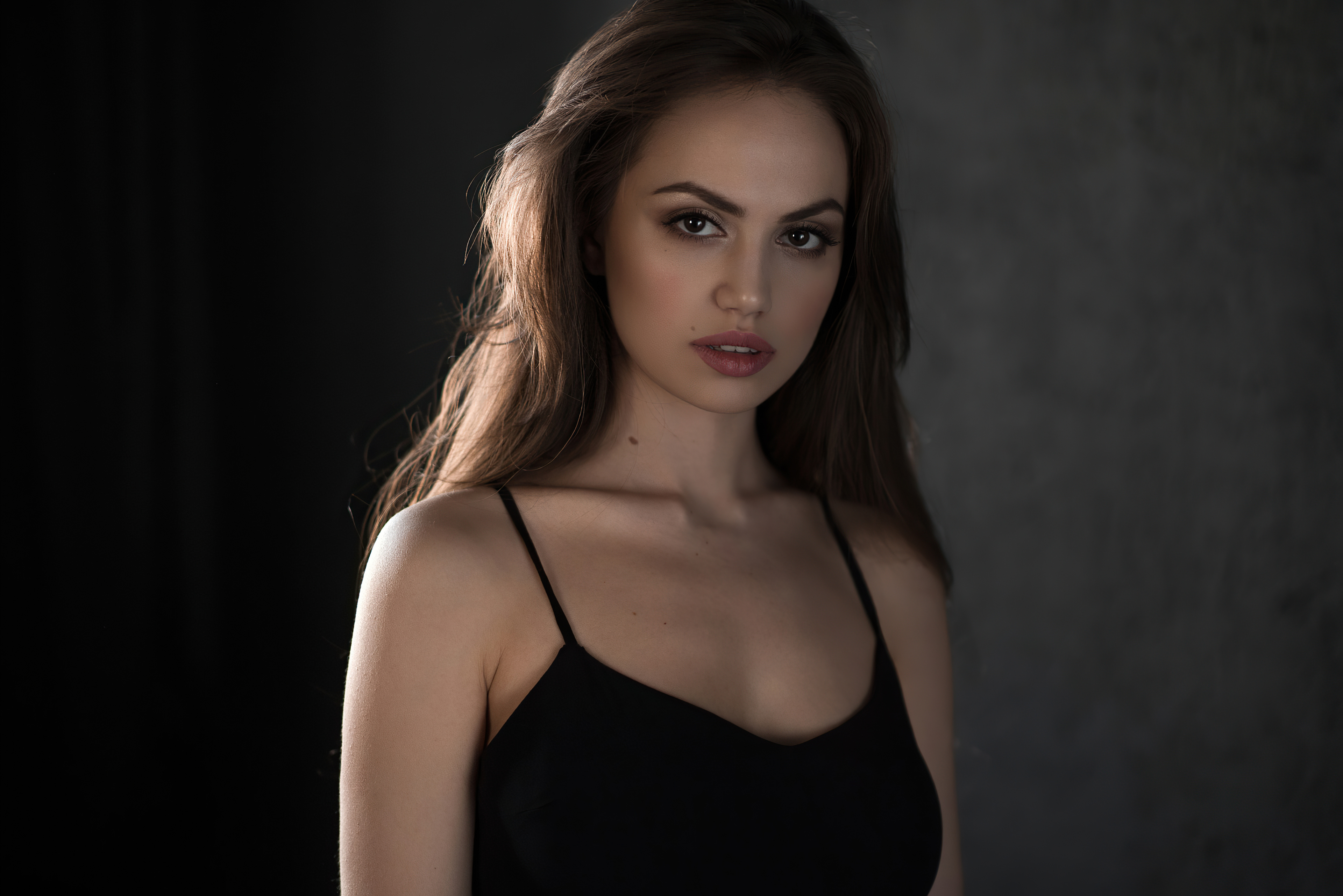 Brunette Woman in Soft Light 4K HD Wallpaper