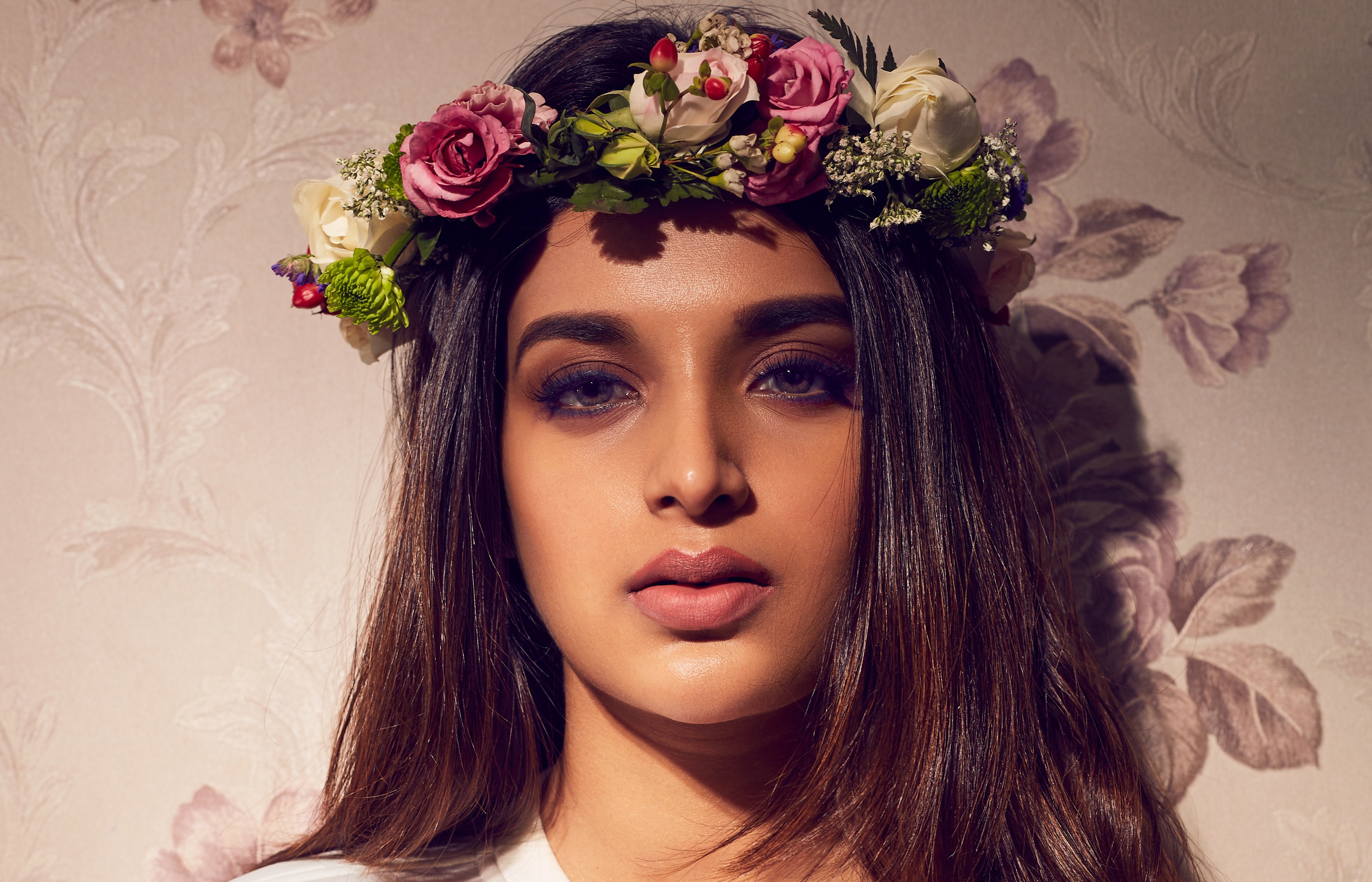 Nidhhi Agerwal wearing a floral wreath HD Wallpaper