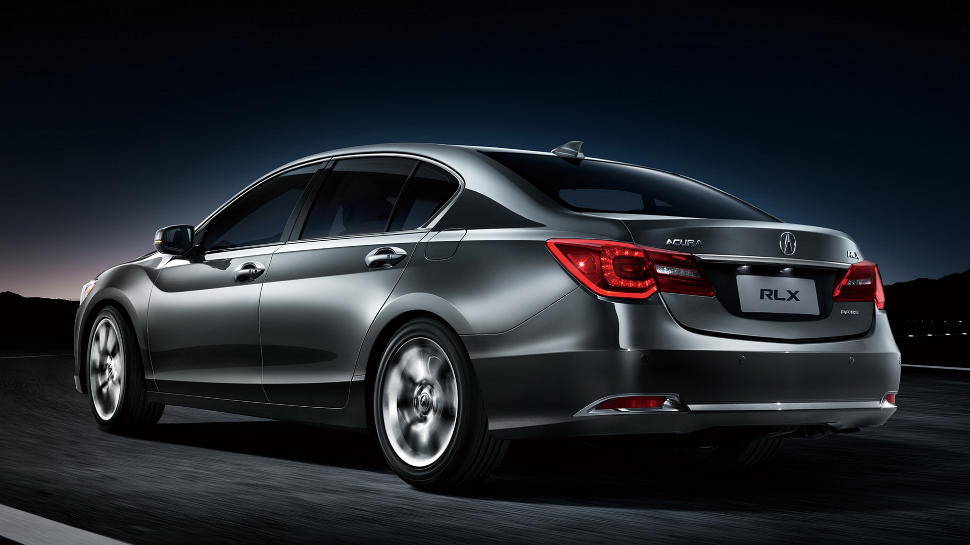 Acura RLX Sedan driving at night HD Wallpaper